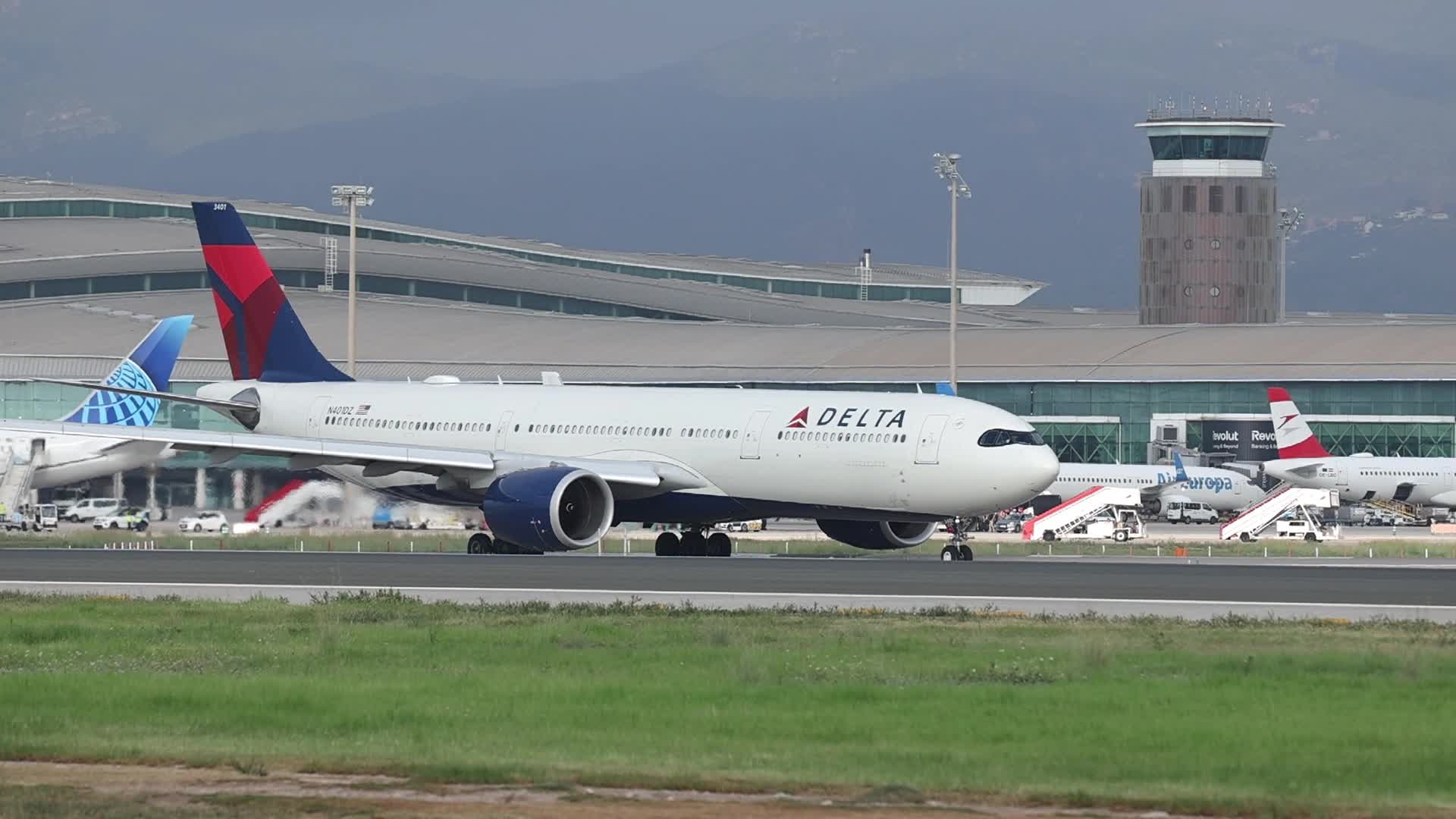 A Delta Air Lines Airbus A330 on the runway at Barcelona Airport