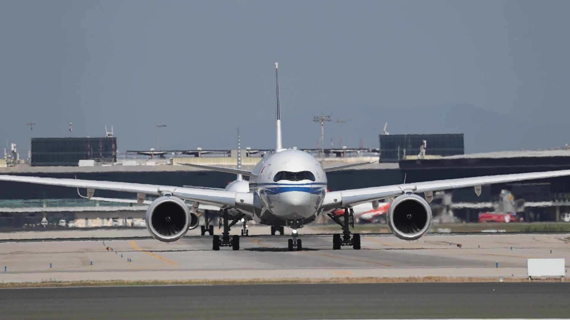 Air China and Turkish Airlines aircraft at Barcelona Airport