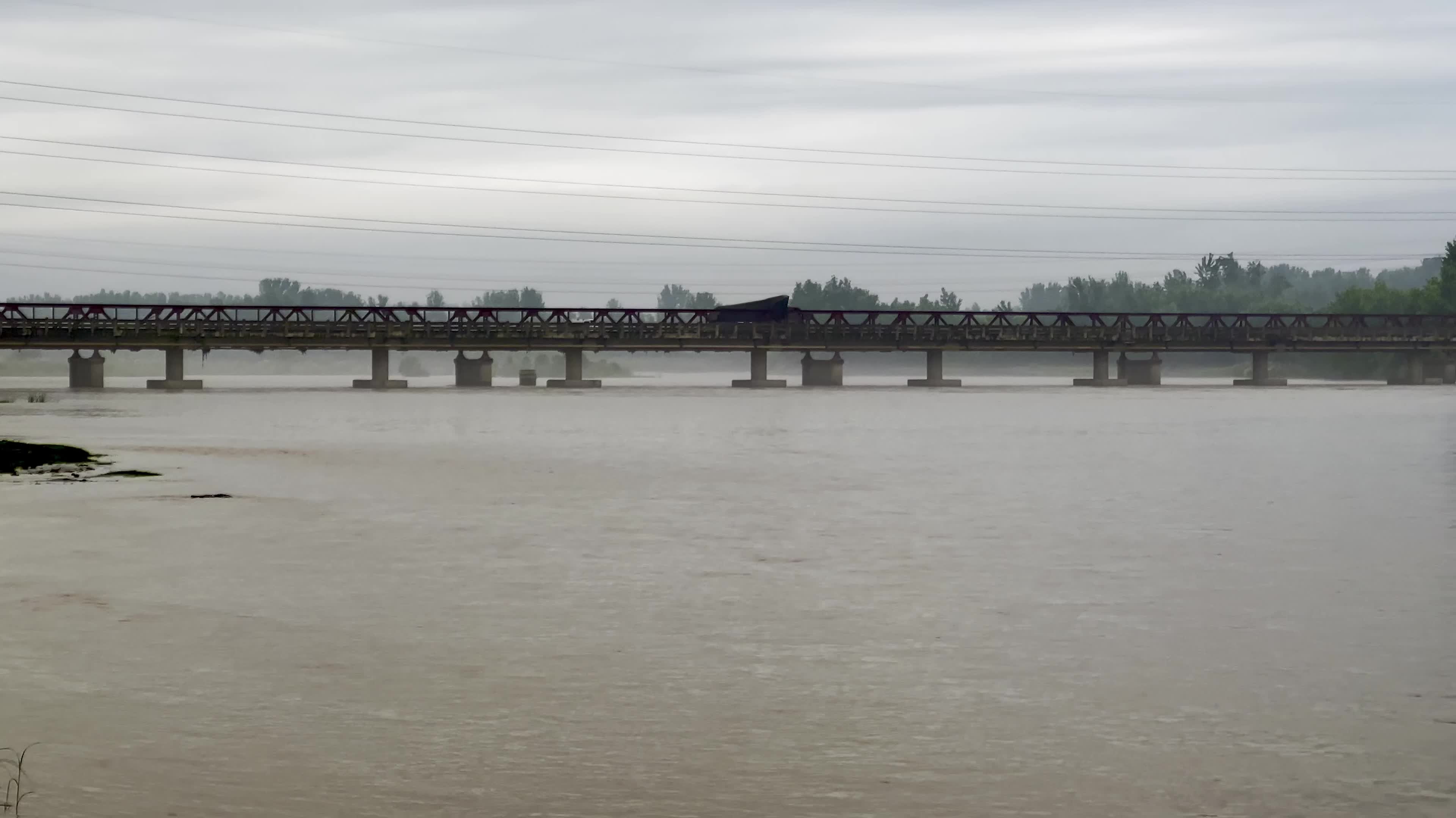High-Level Flood Surge Moves Through Kabul River in Pakistan's Charsadda District