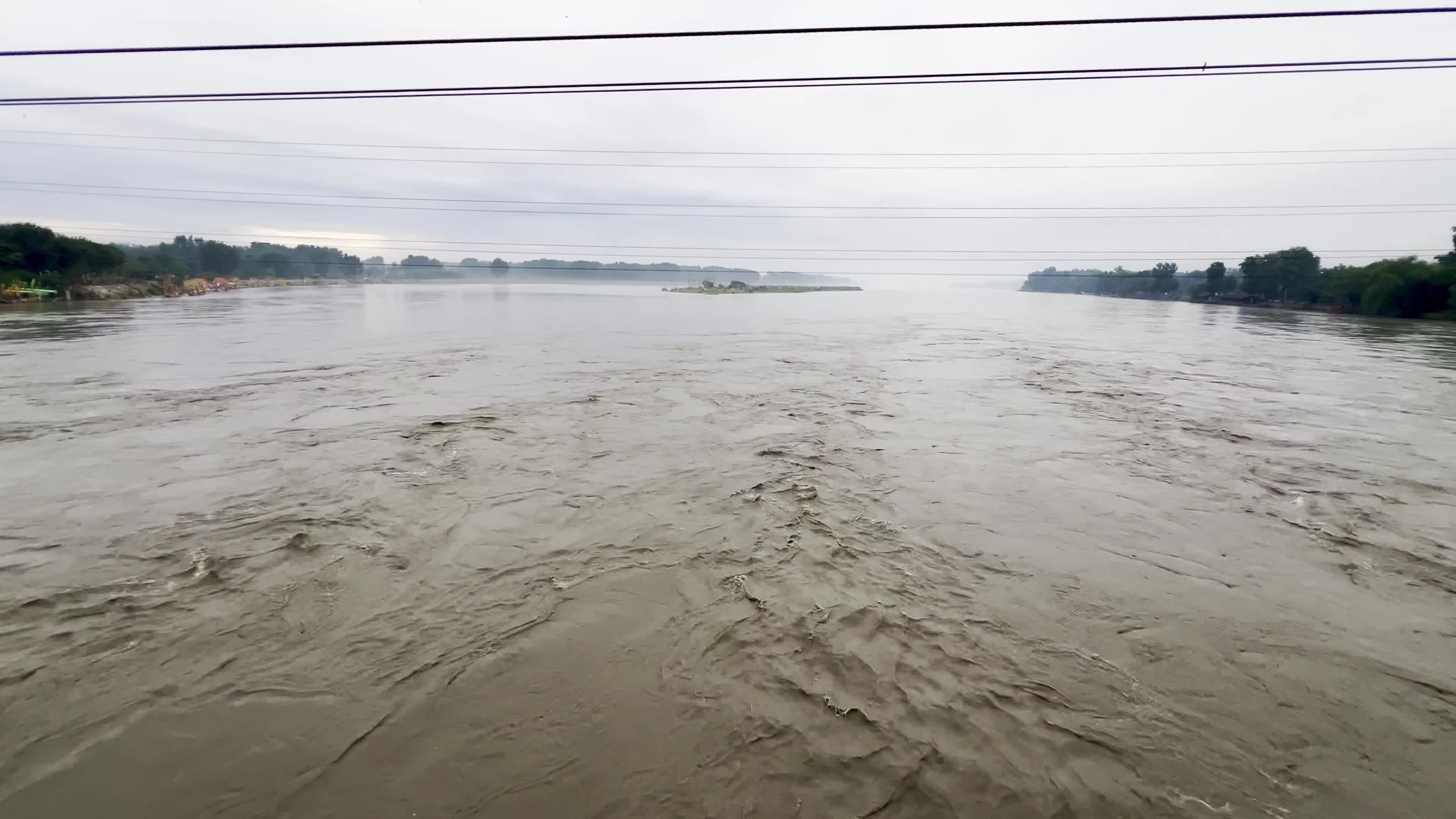High-Level Flood Surge Moves Through Kabul River in Pakistan's Charsadda District