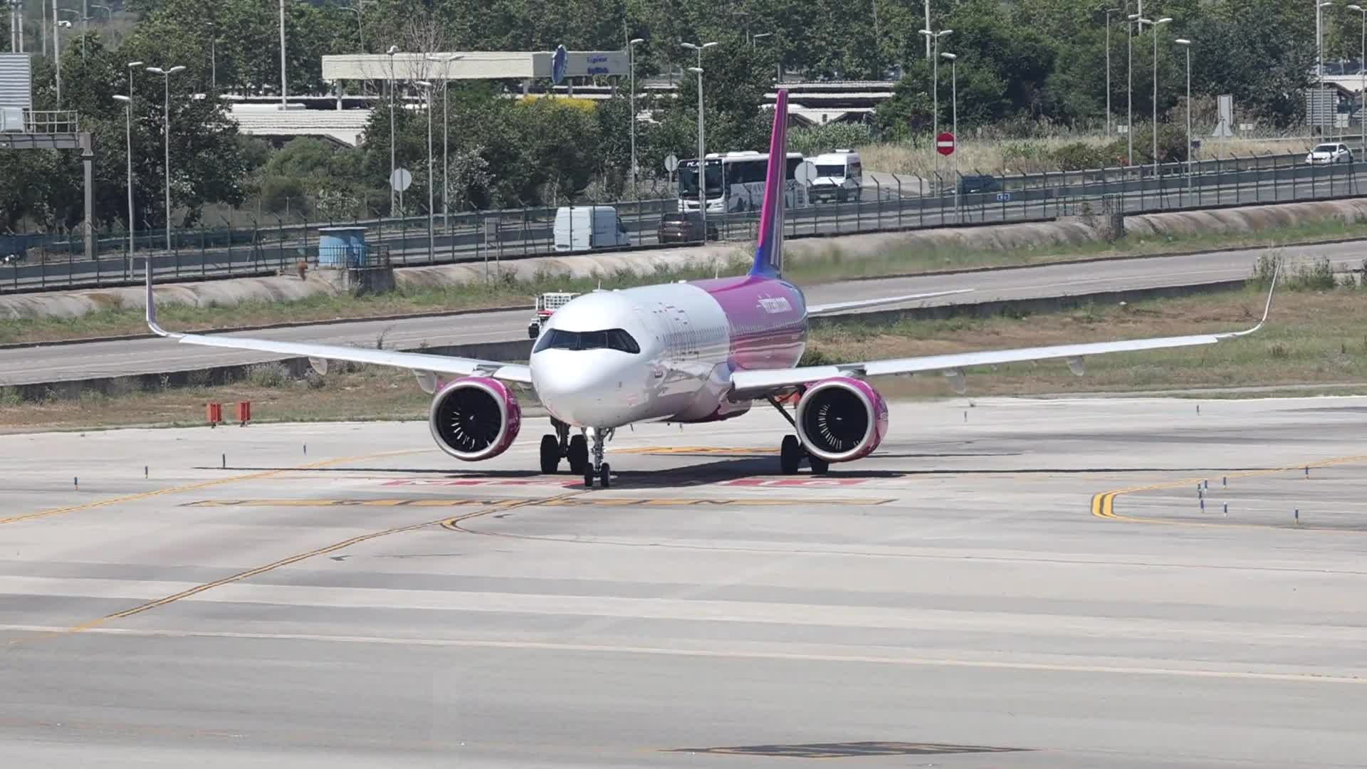 A Wizz Air Airbus A321 on the runway at Barcelona Airport