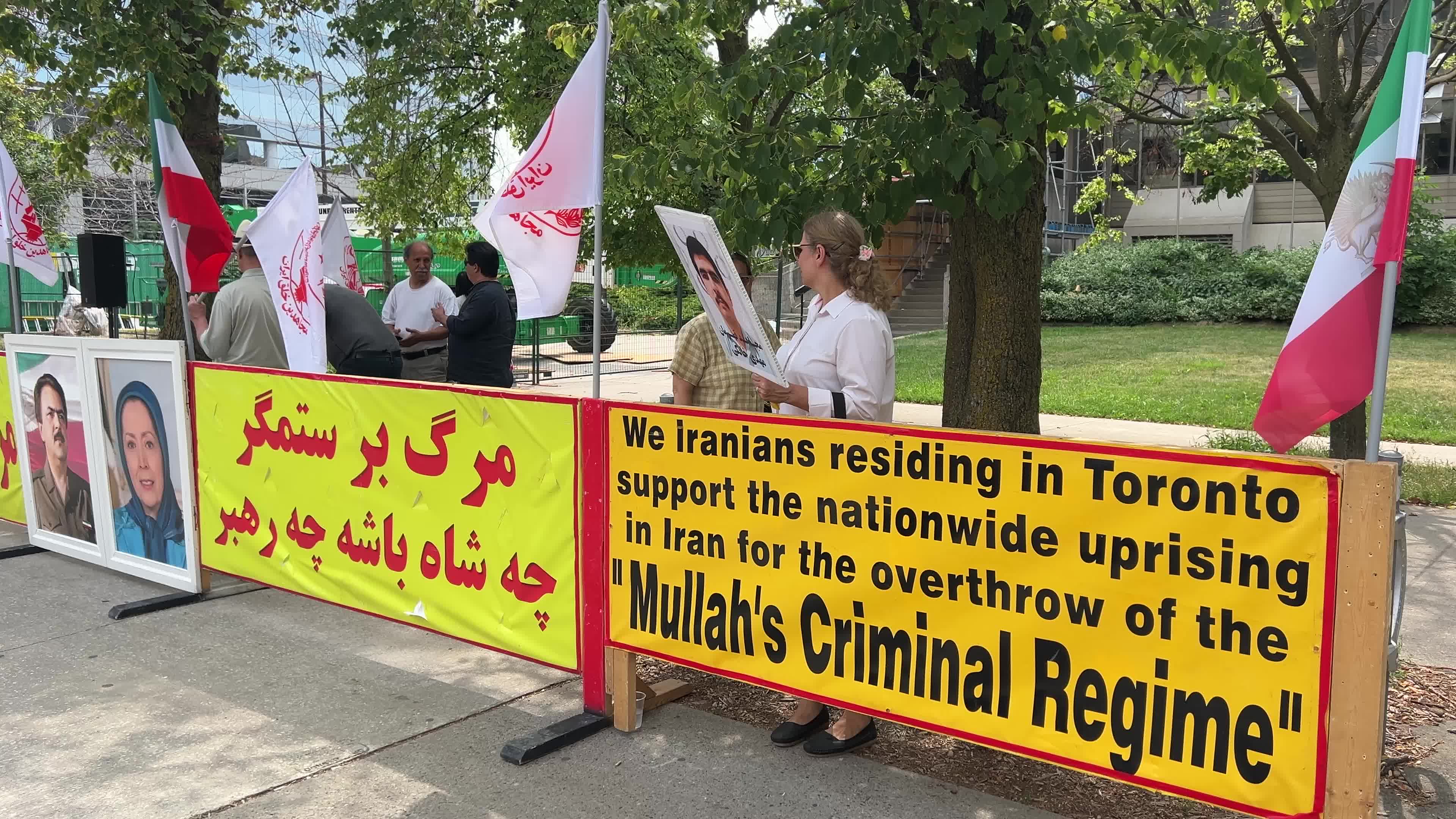 Members of the People's Mojahedin Organization of Iran protest in Toronto