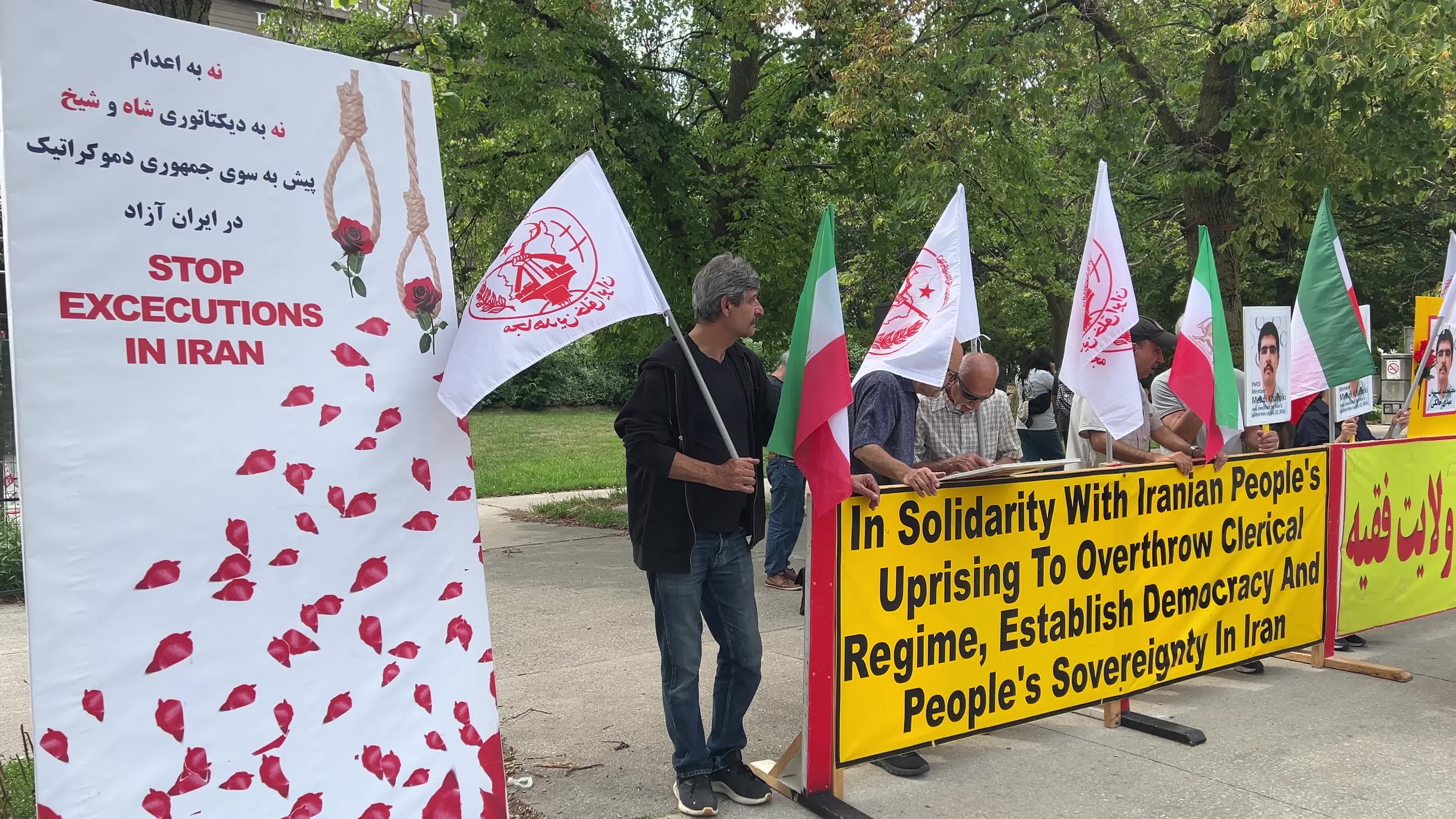 Members of the People's Mojahedin Organization of Iran protest in Toronto