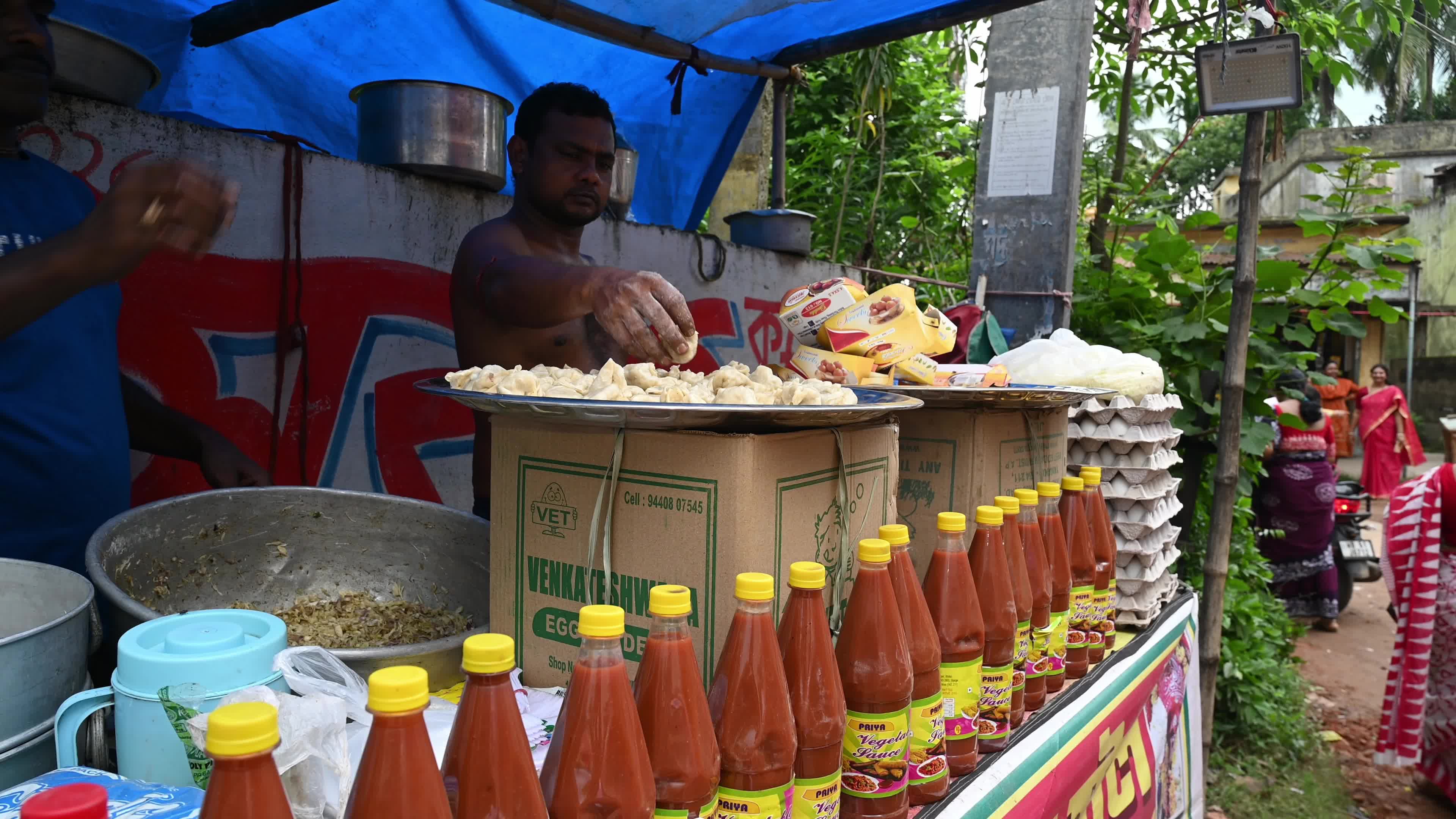 Steamed momos at a village festival - Dumpling Snack - Street Food