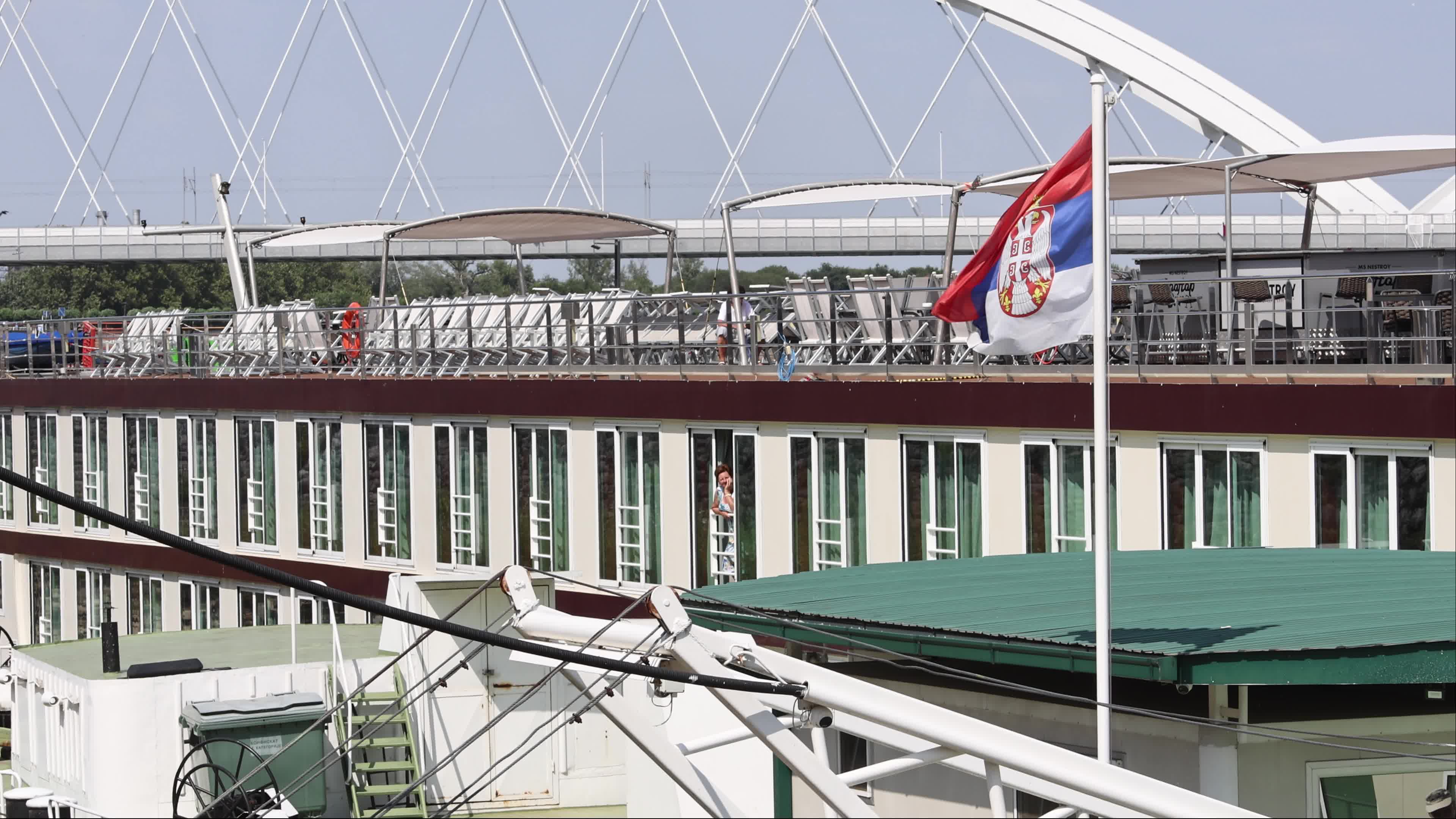 Tourists disembark from a river cruise ship