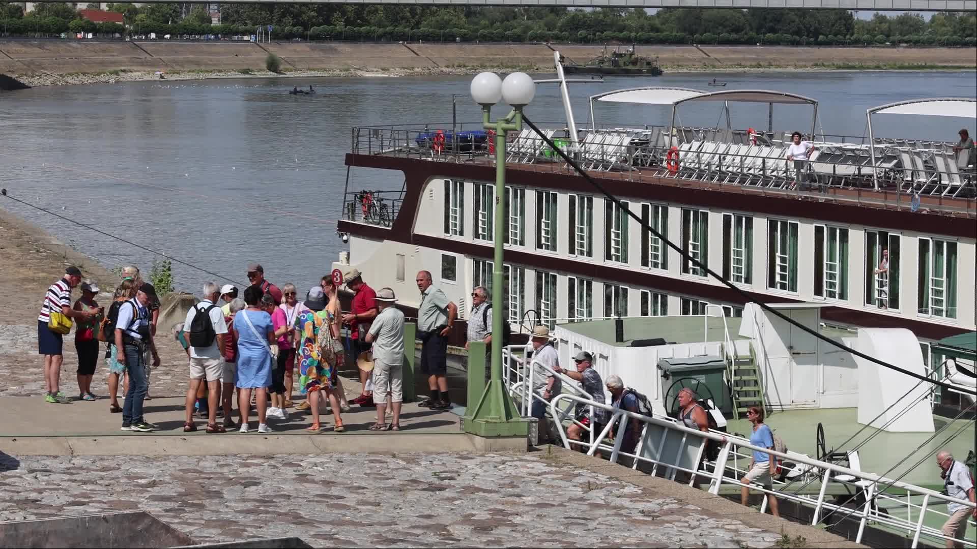 Tourists disembark from a river cruise ship - 07/26/2026