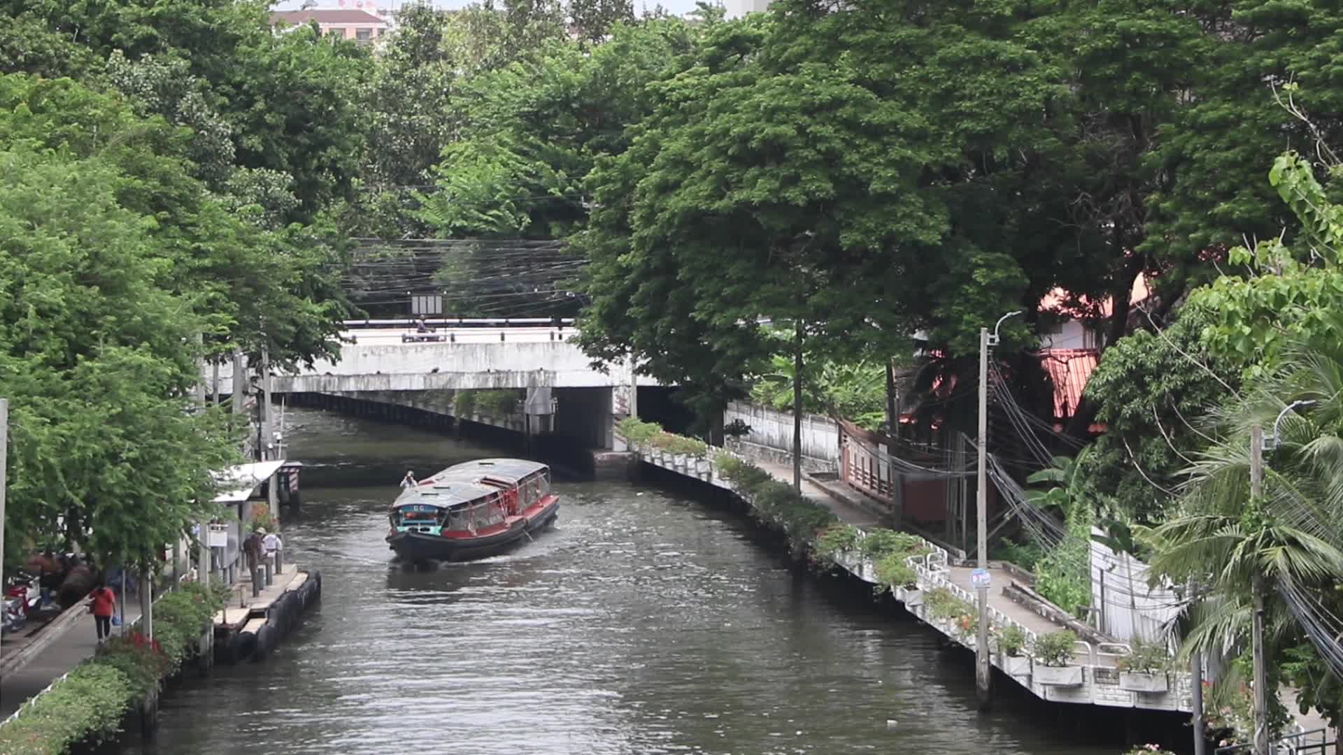 Community boat run on canal