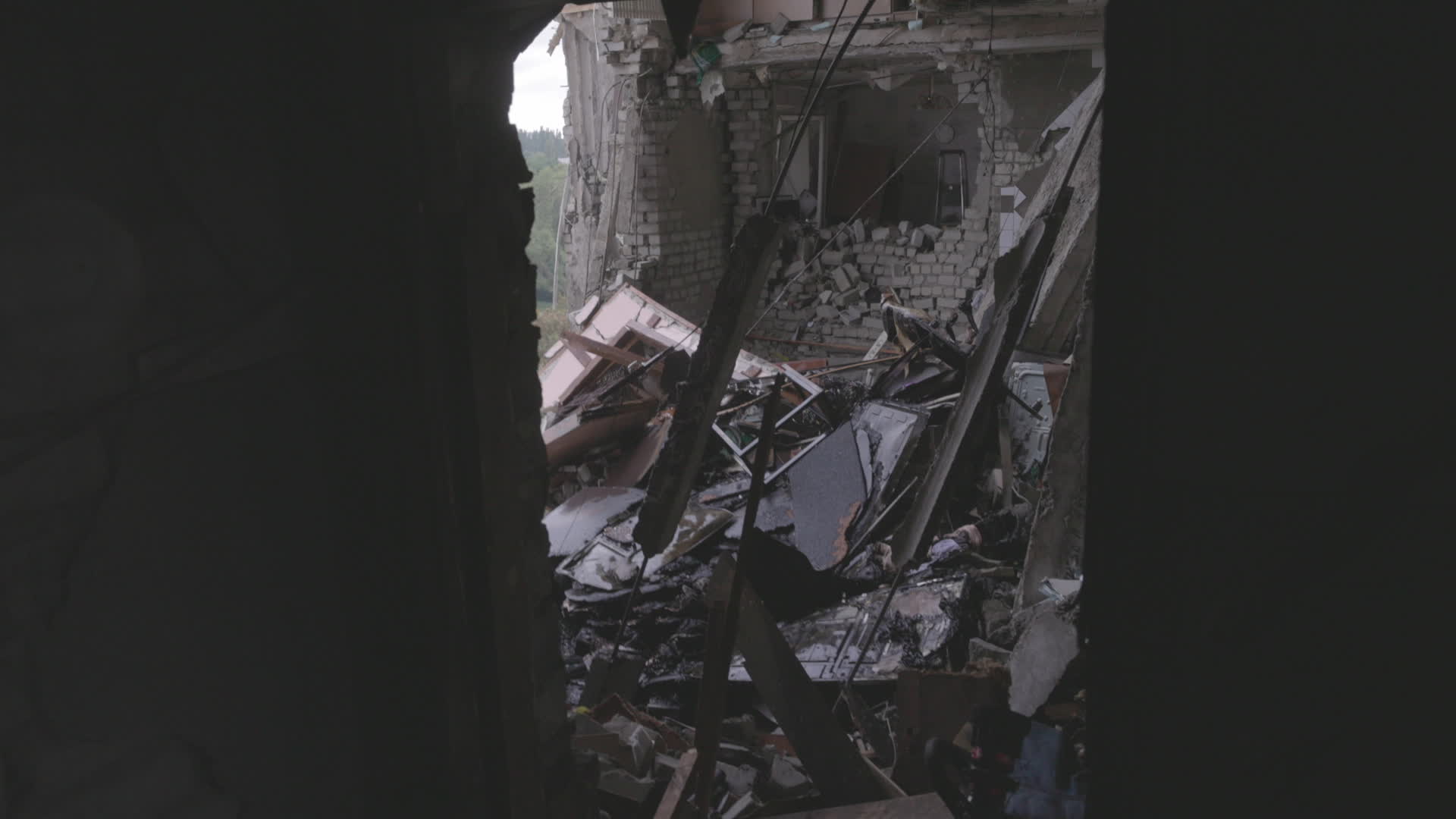 Direct hit residential building n Kharkiv