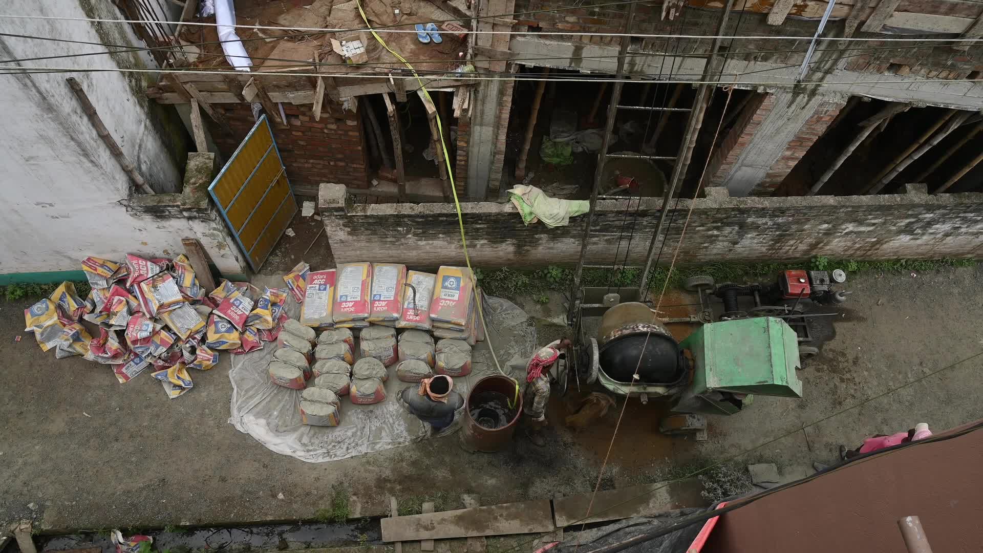 Masonry - Indian Economy - Daily wage labor in India - Concrete roof making in India