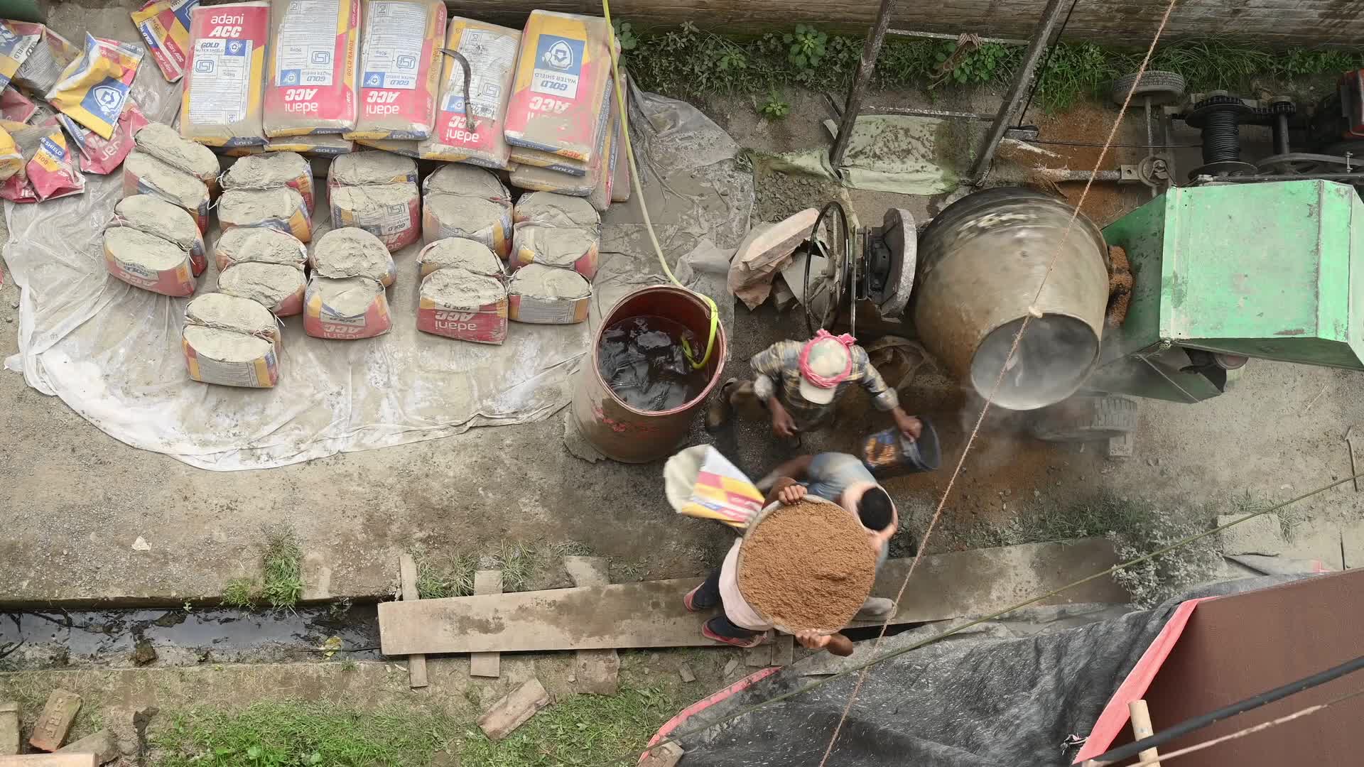 Masonry - Indian Economy - Daily wage labor in India - Concrete roof making in India