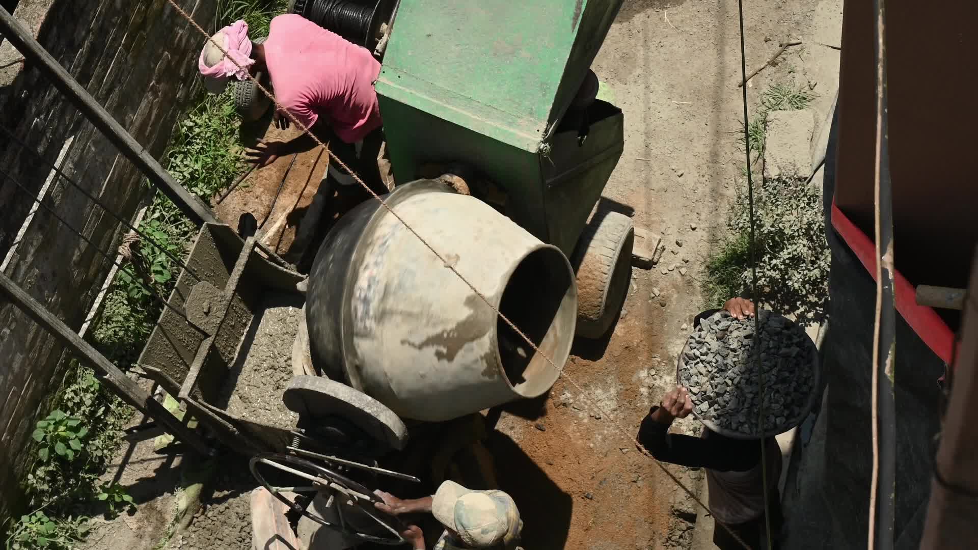 Masonry - Indian Economy - Daily wage labor in India - Concrete roof making in India