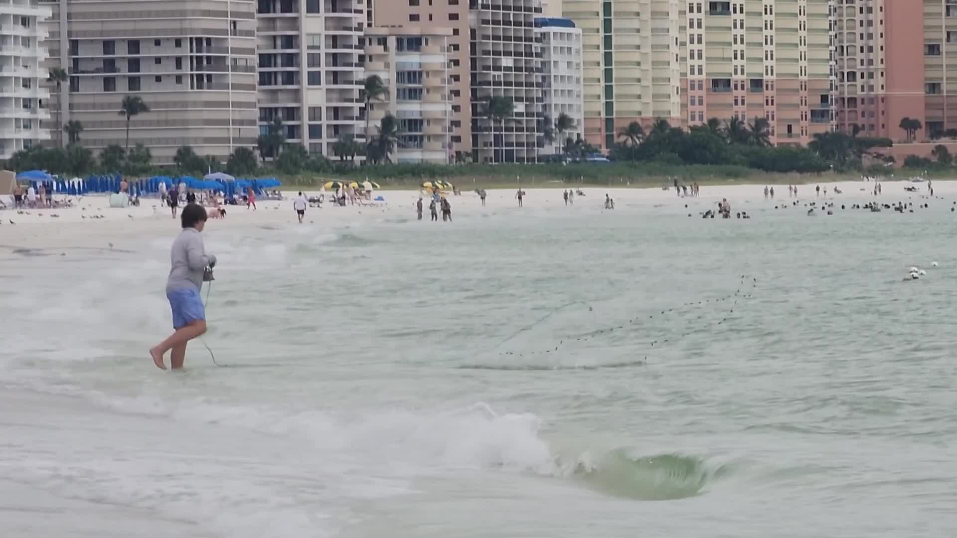 Net fishing in Marco Island, Florida, USA