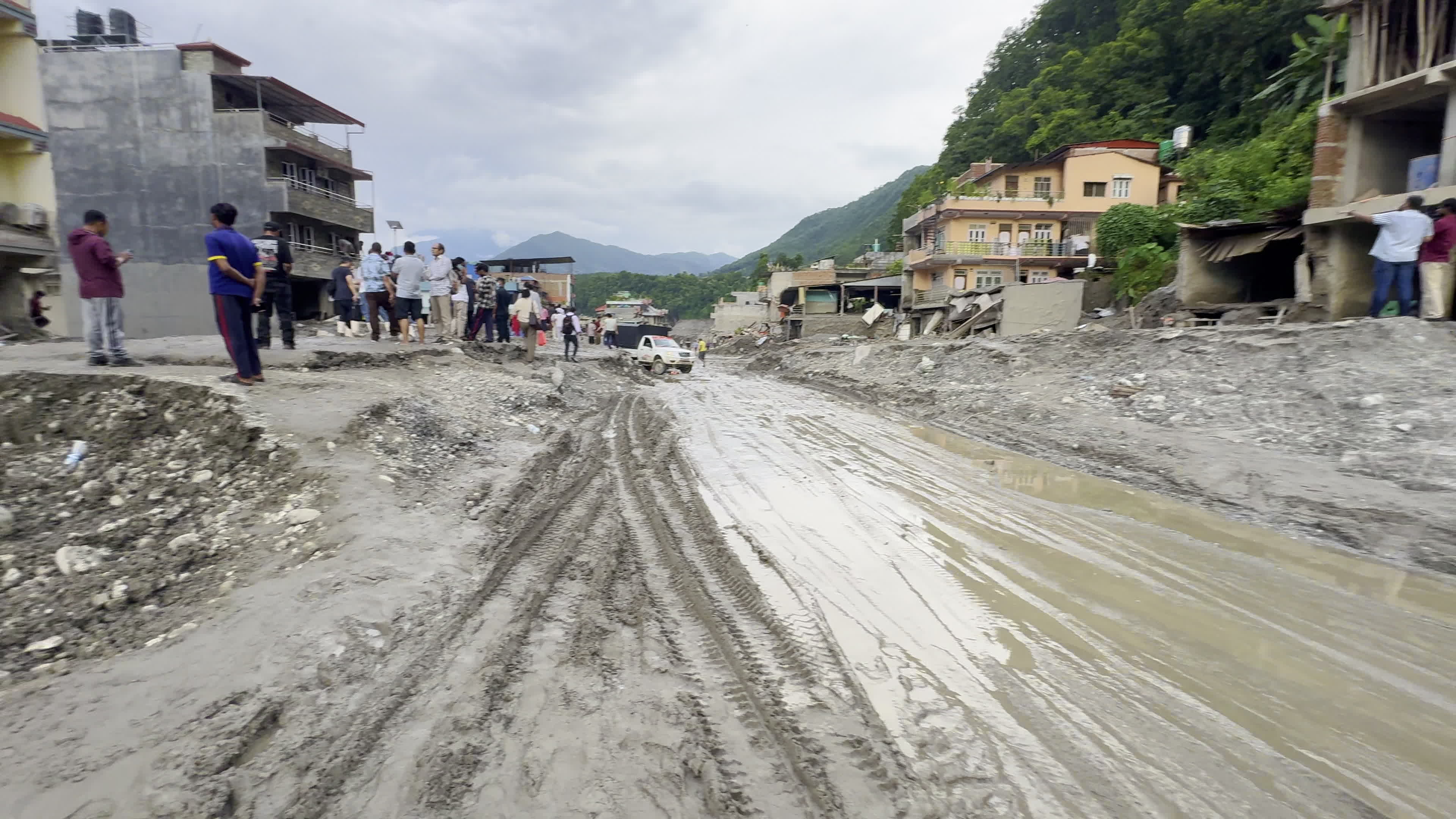 NEPAL: Devastated Street Covered in Thick Silt and Mud Following Trishuli River Flash Flood