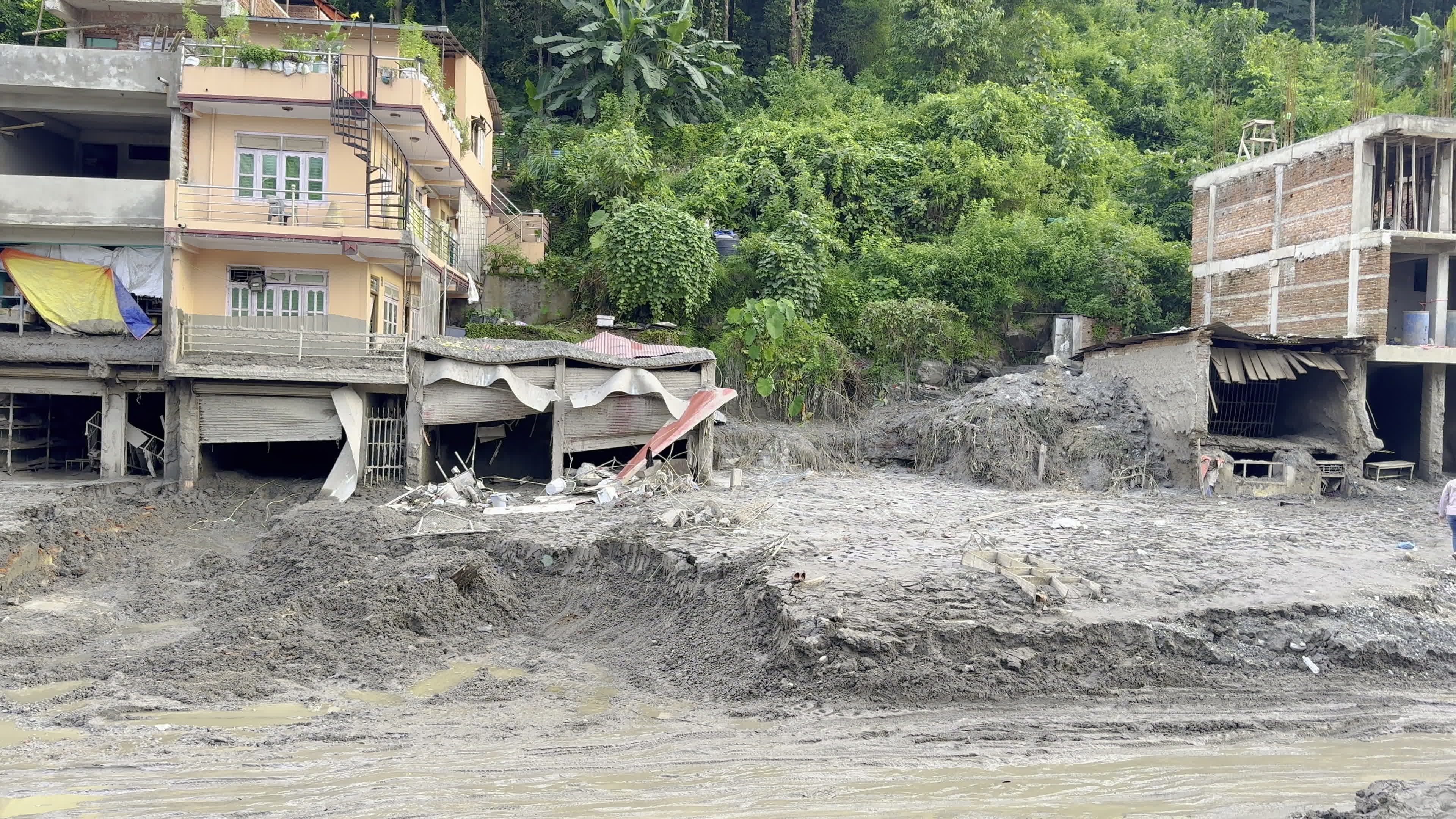 NEPAL: Ground Floors of Commercial and Residential Buildings Buried by Trishuli Flood Silt