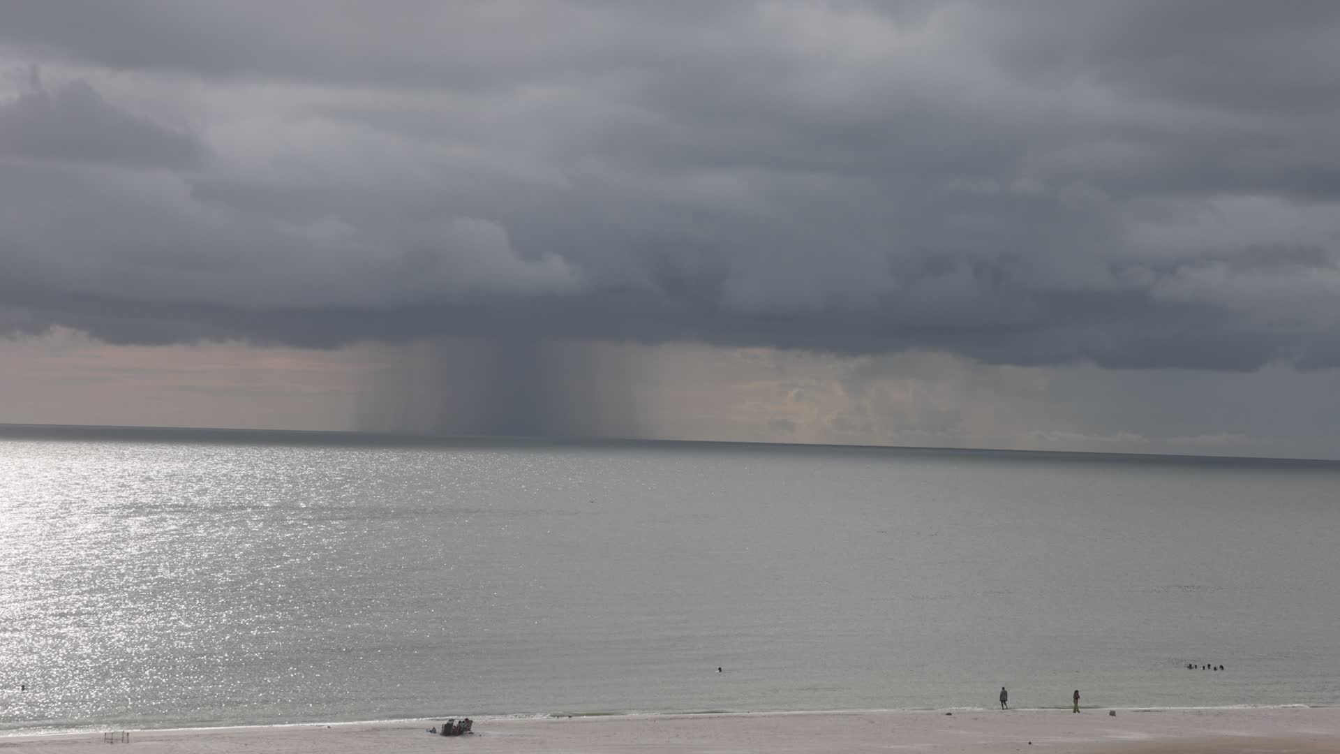 Dark thunderstorm clouds loom over Crescent Beach in Florida
