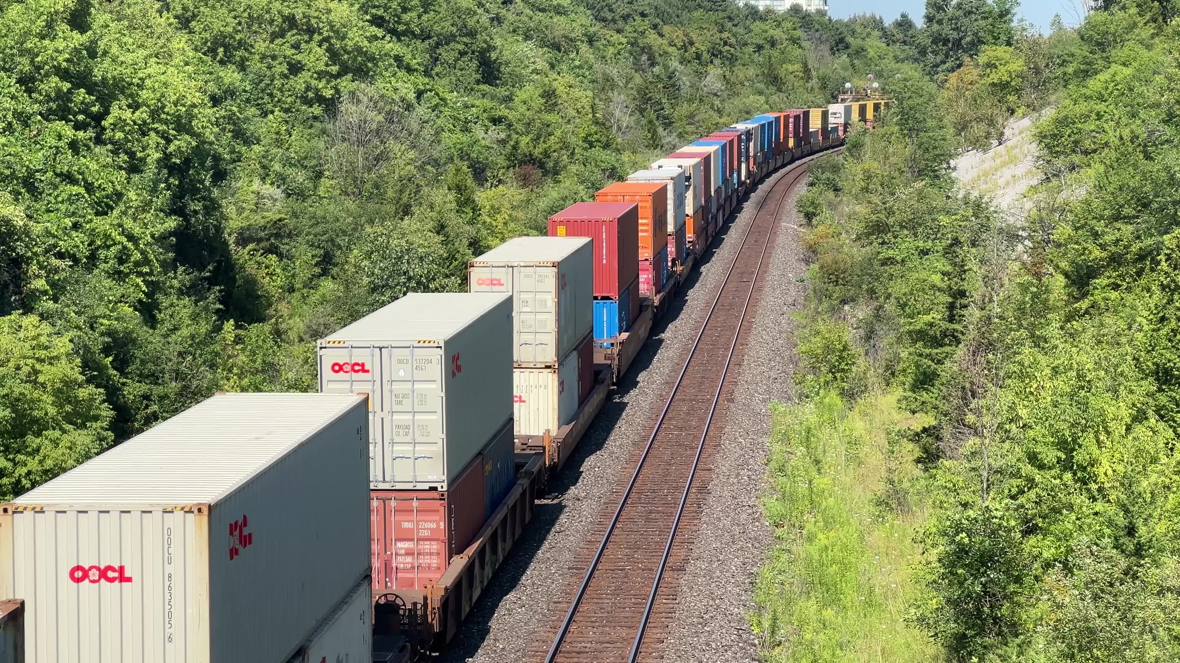Train carrying stacked intermodal shipping containers
