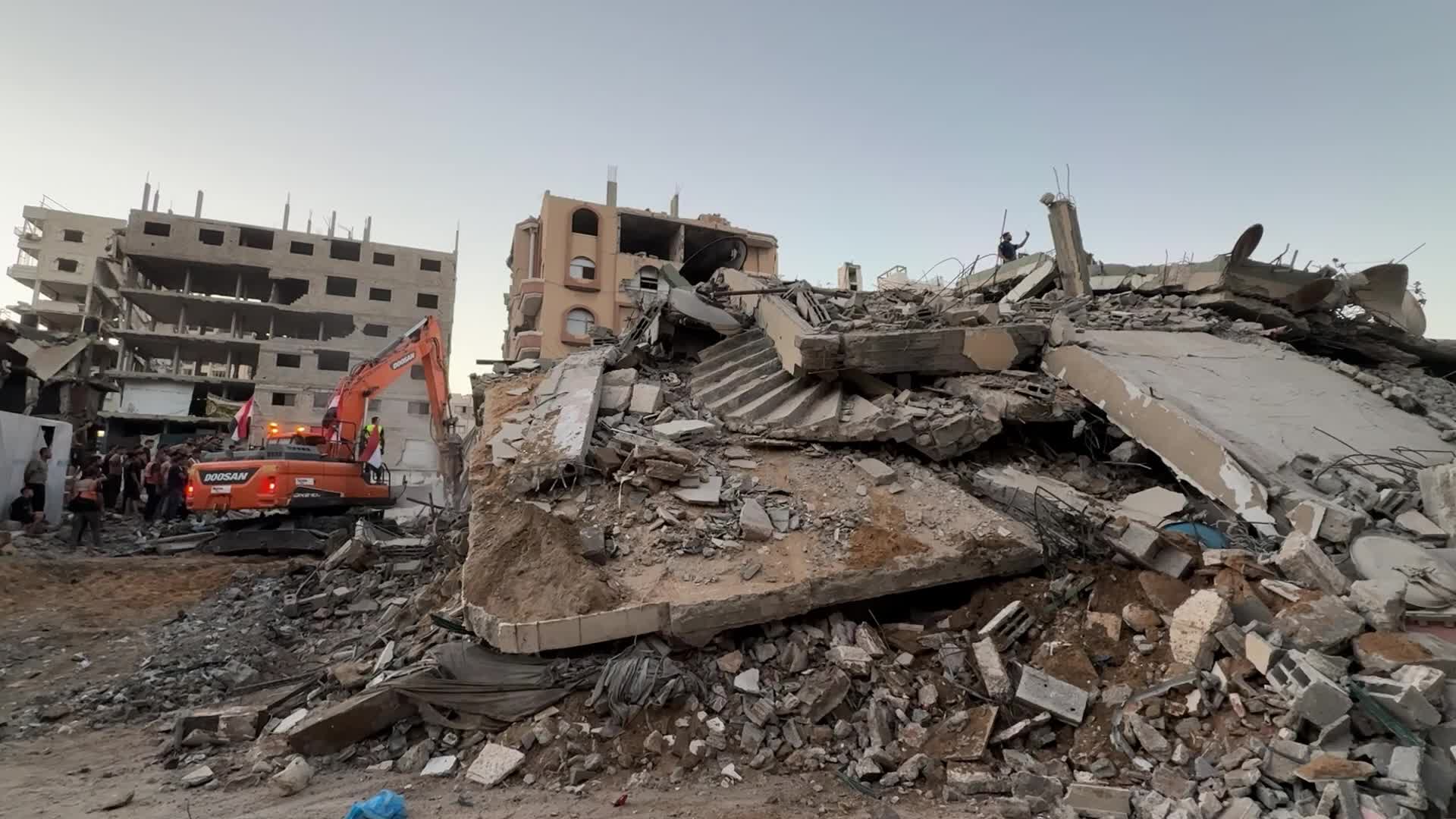 War-damaged building collapses in Gaza City
