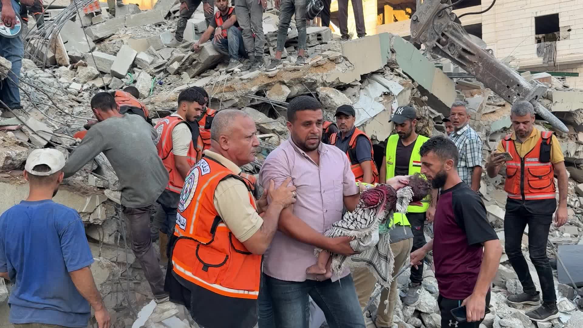 War-damaged building collapses in Gaza City