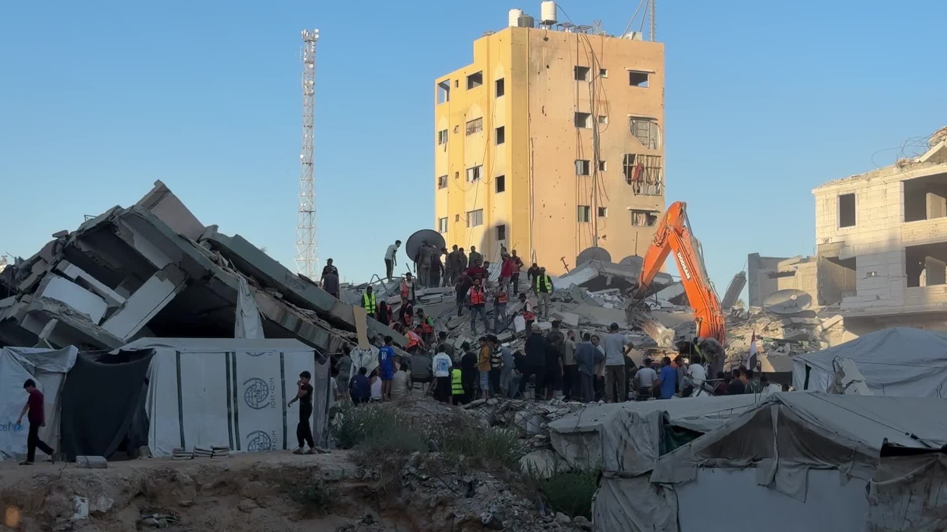 War-damaged building collapses in Gaza City