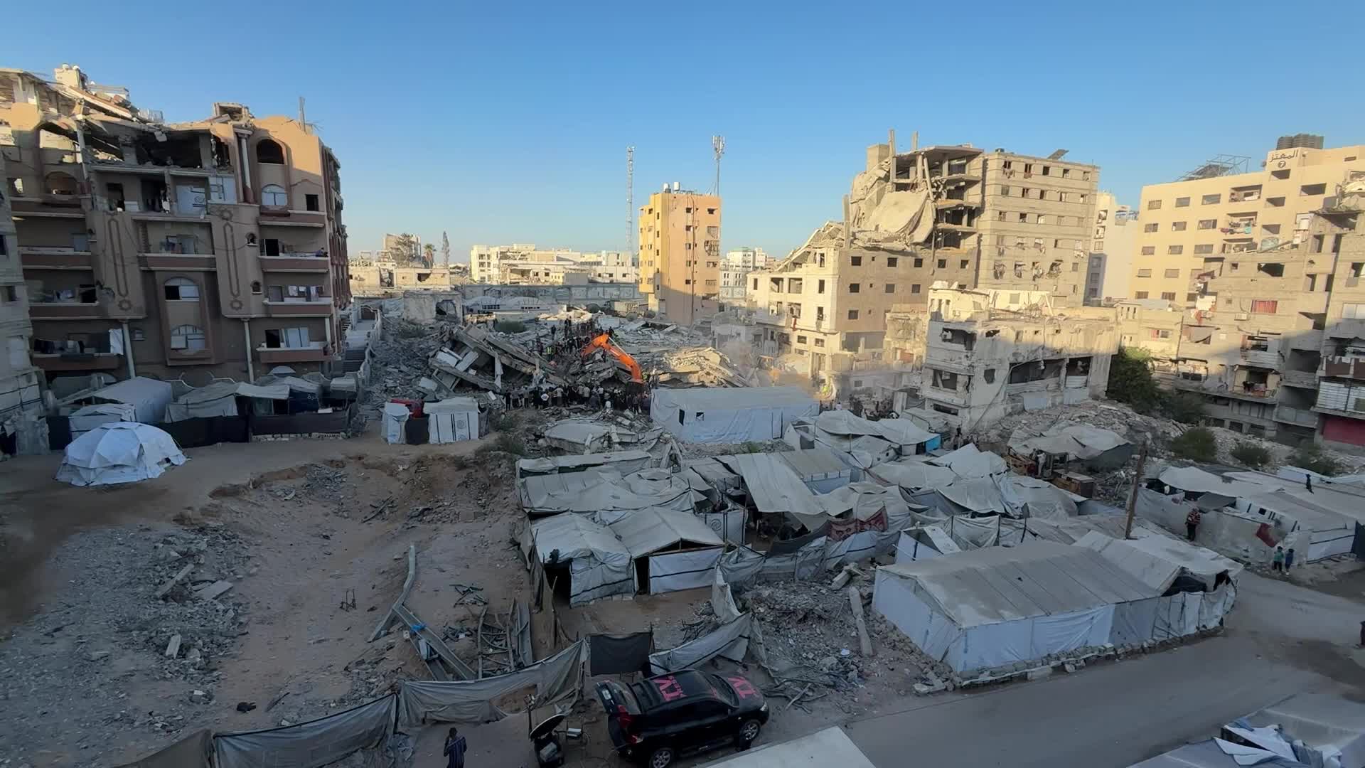 War-damaged building collapses in Gaza City