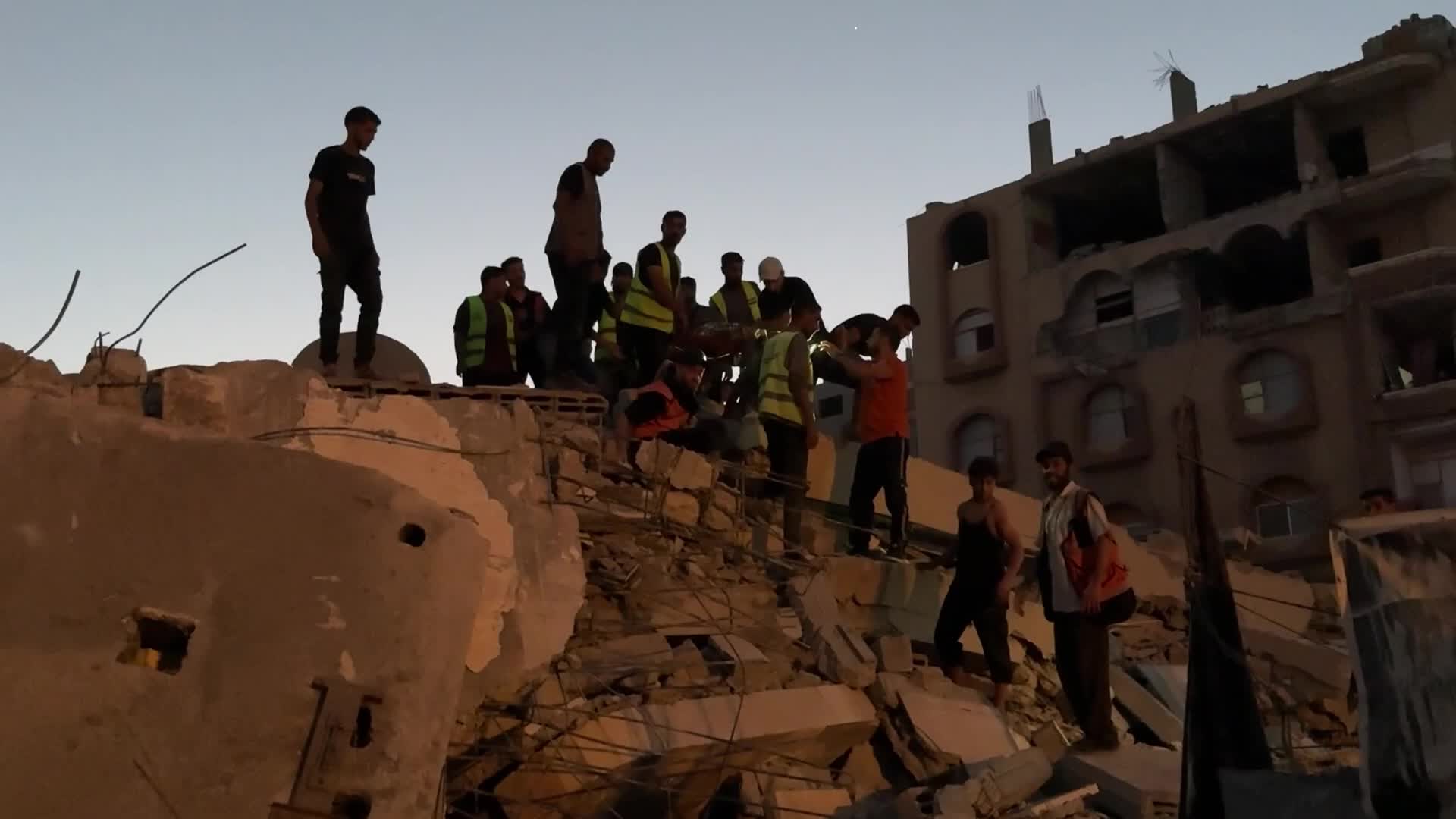 War-damaged building collapses in Gaza City