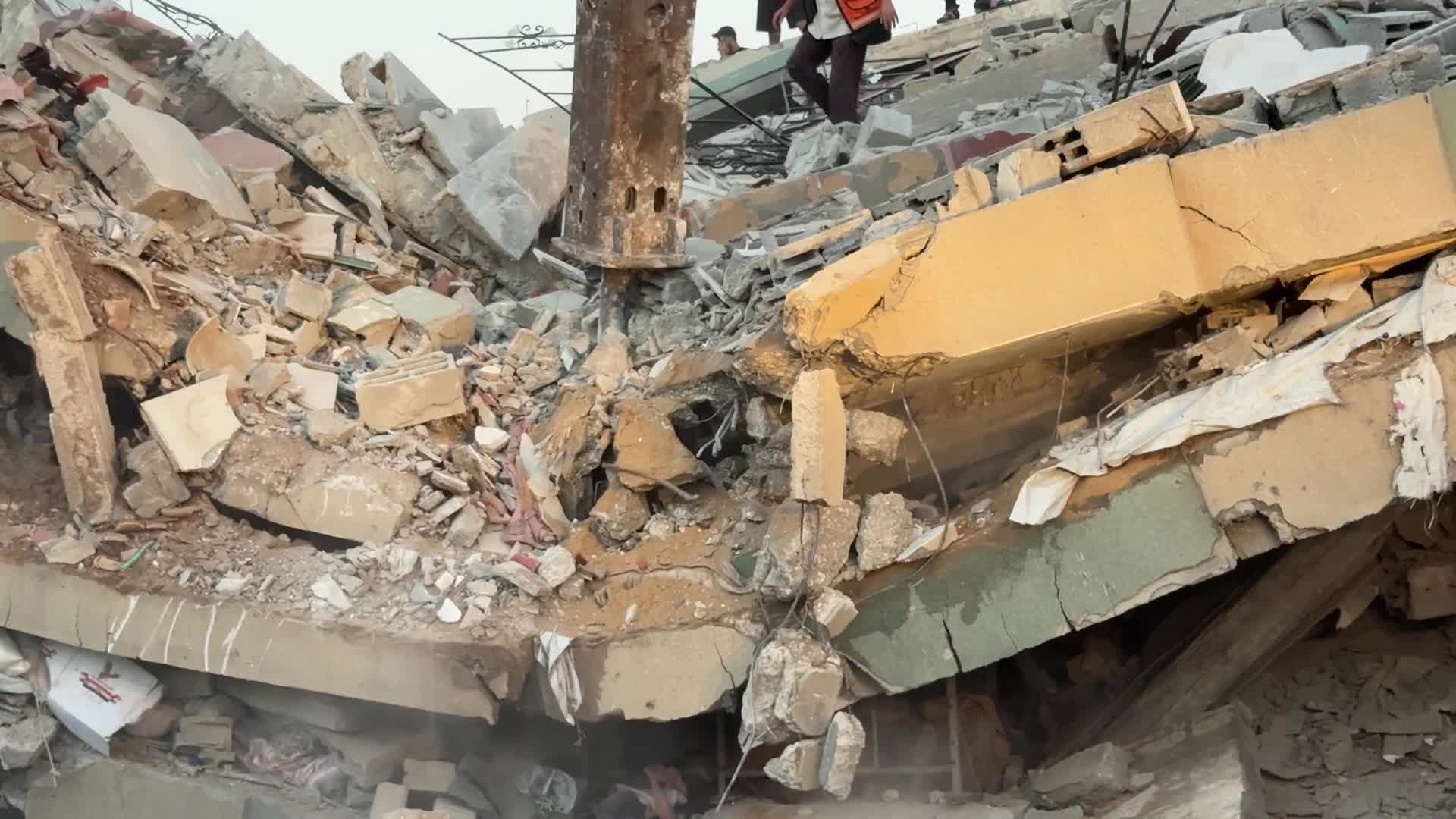 War-damaged building collapses in Gaza City