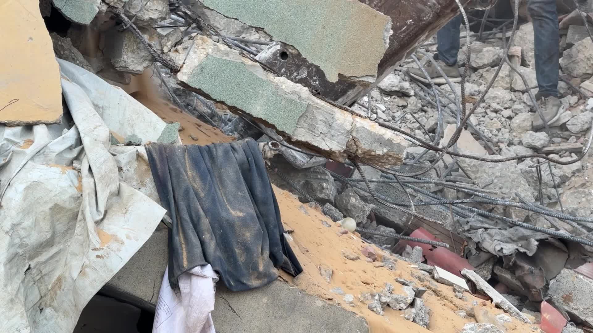 War-damaged building collapses in Gaza City