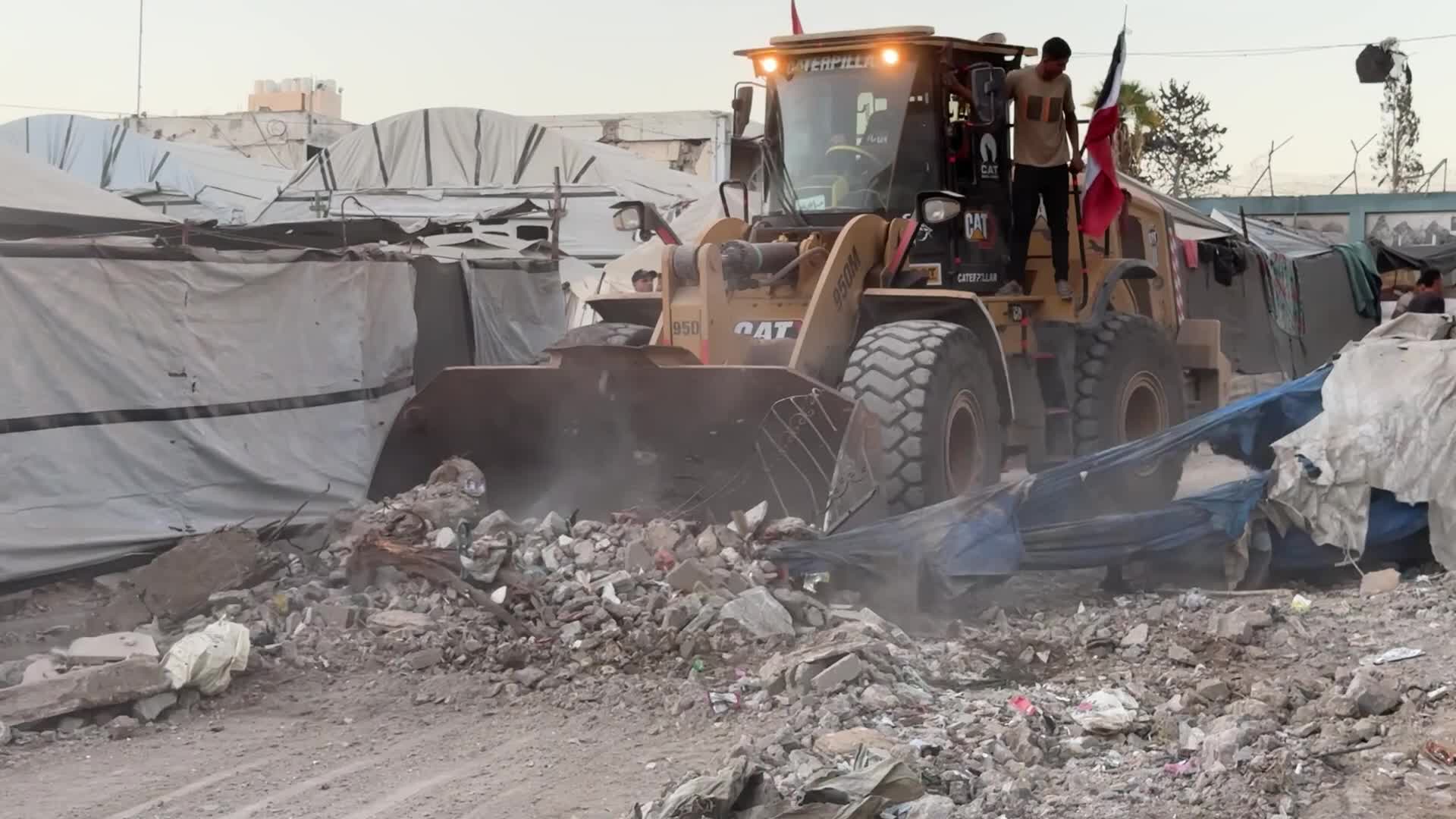War-damaged building collapses in Gaza City
