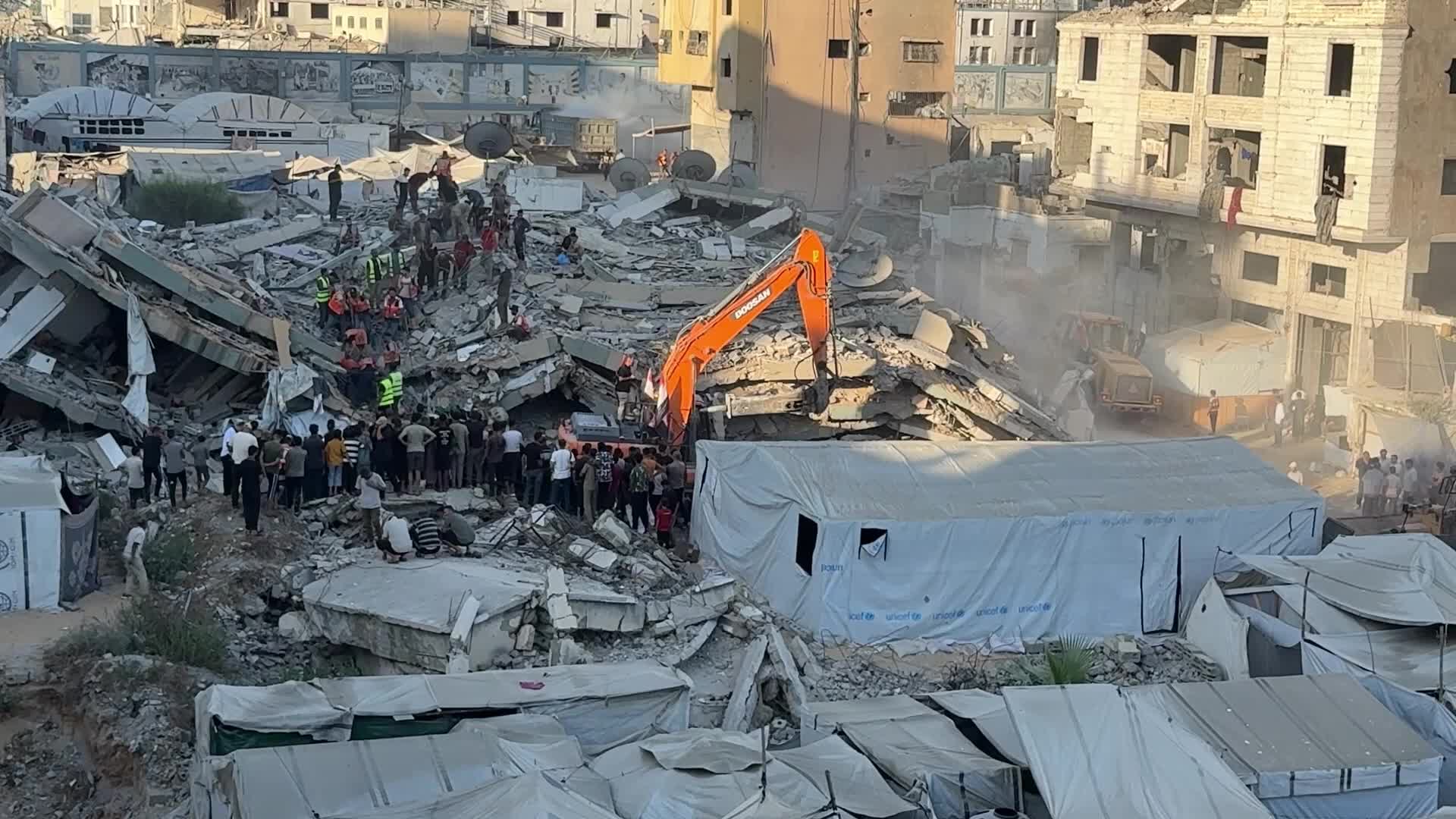 War-damaged building collapses in Gaza City