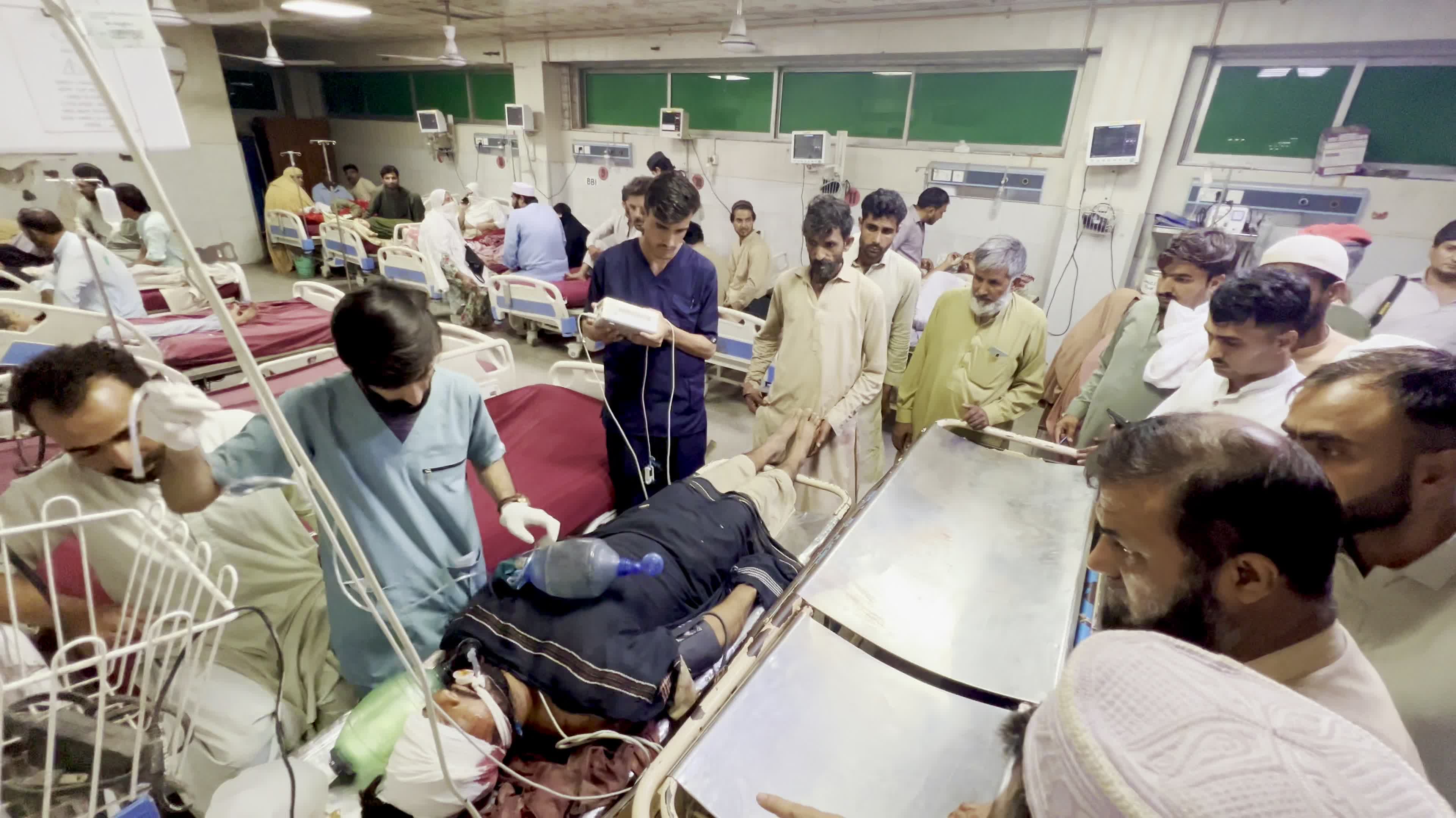 Blast victim receive treatment at a hospital in Peshawar