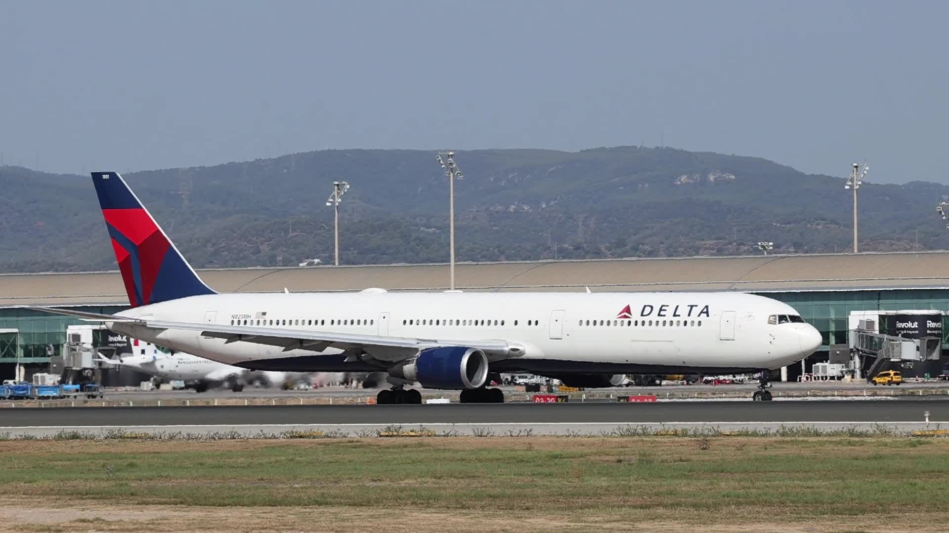 A Delta Air Lines Boeing 767 prepares for takeoff from Barcelona Airport