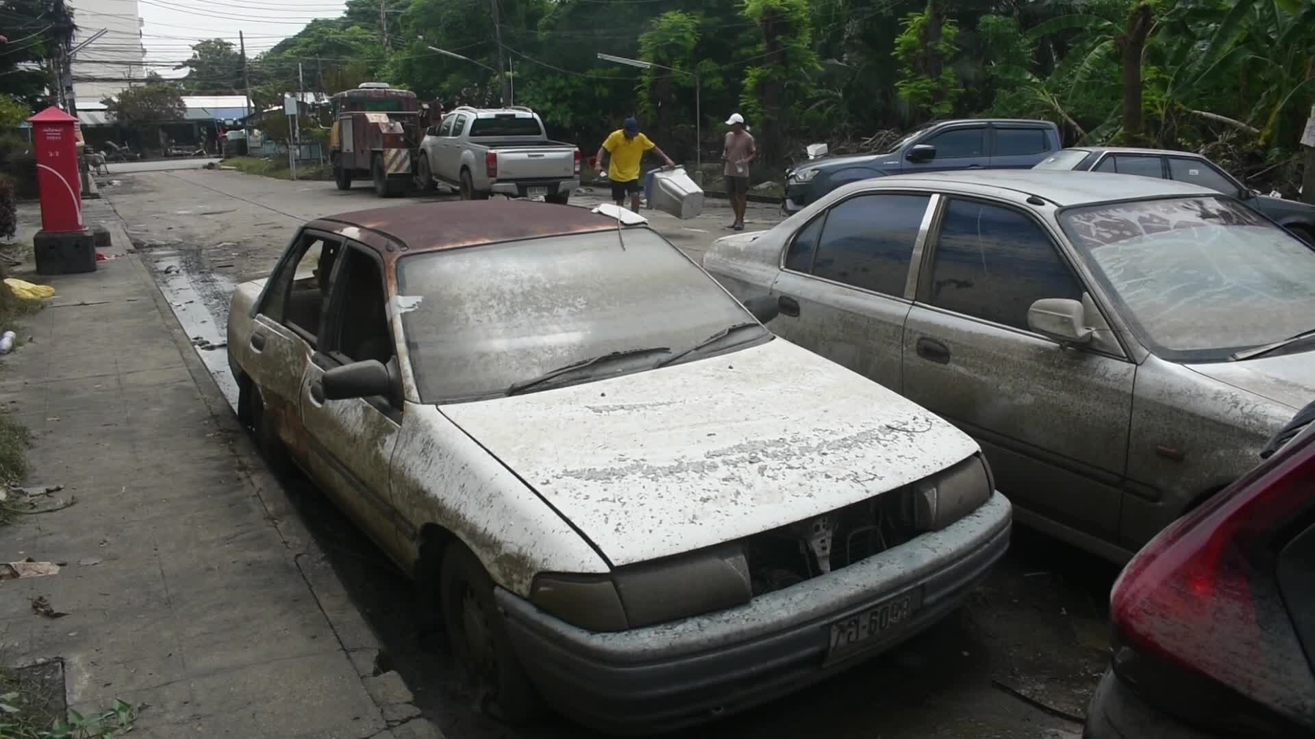 General view shows damage vehicles cause from heavy floods in Bangkok.