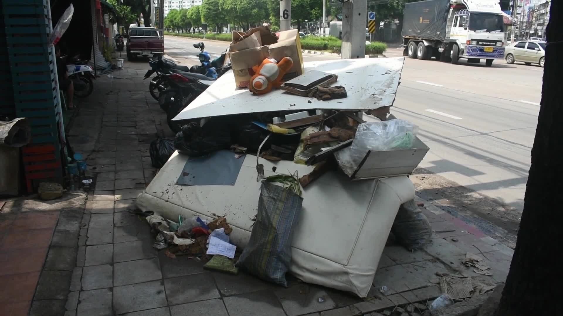 A large pile of rubbish at street side in Bangkok.
