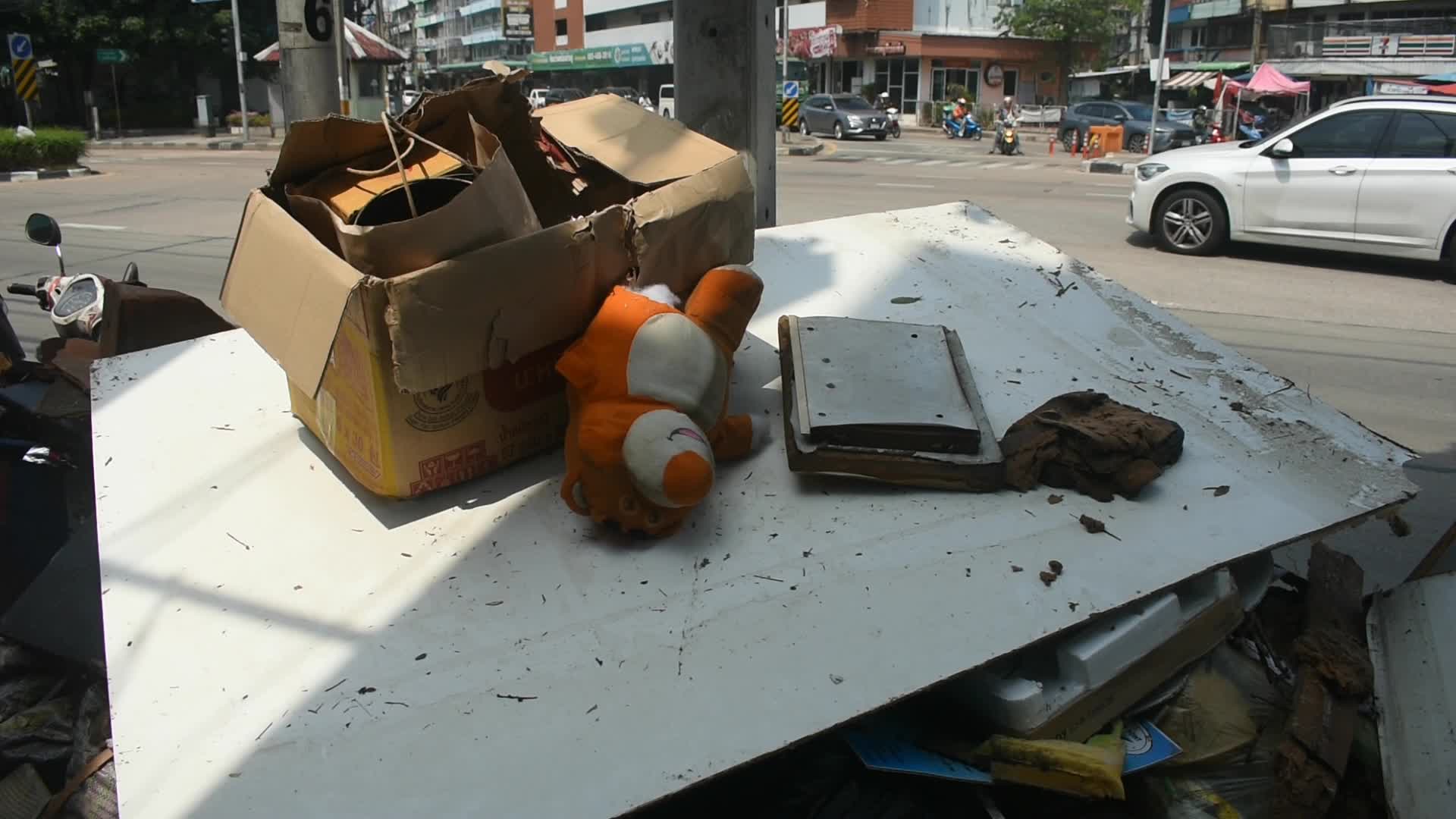 A large pile of rubbish at street side in Bangkok.