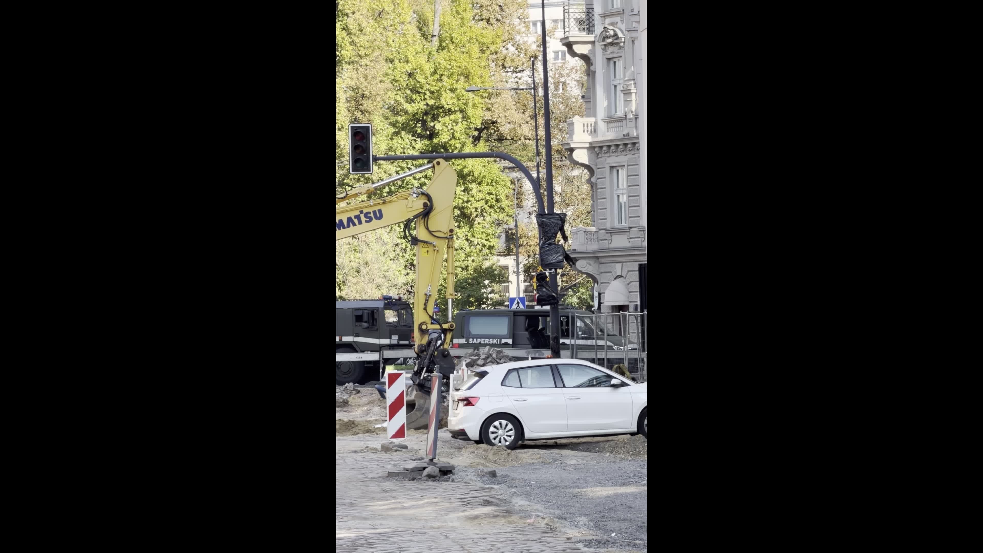 Emergency services respond after construction company finds alleged World War II bomb in Warsaw