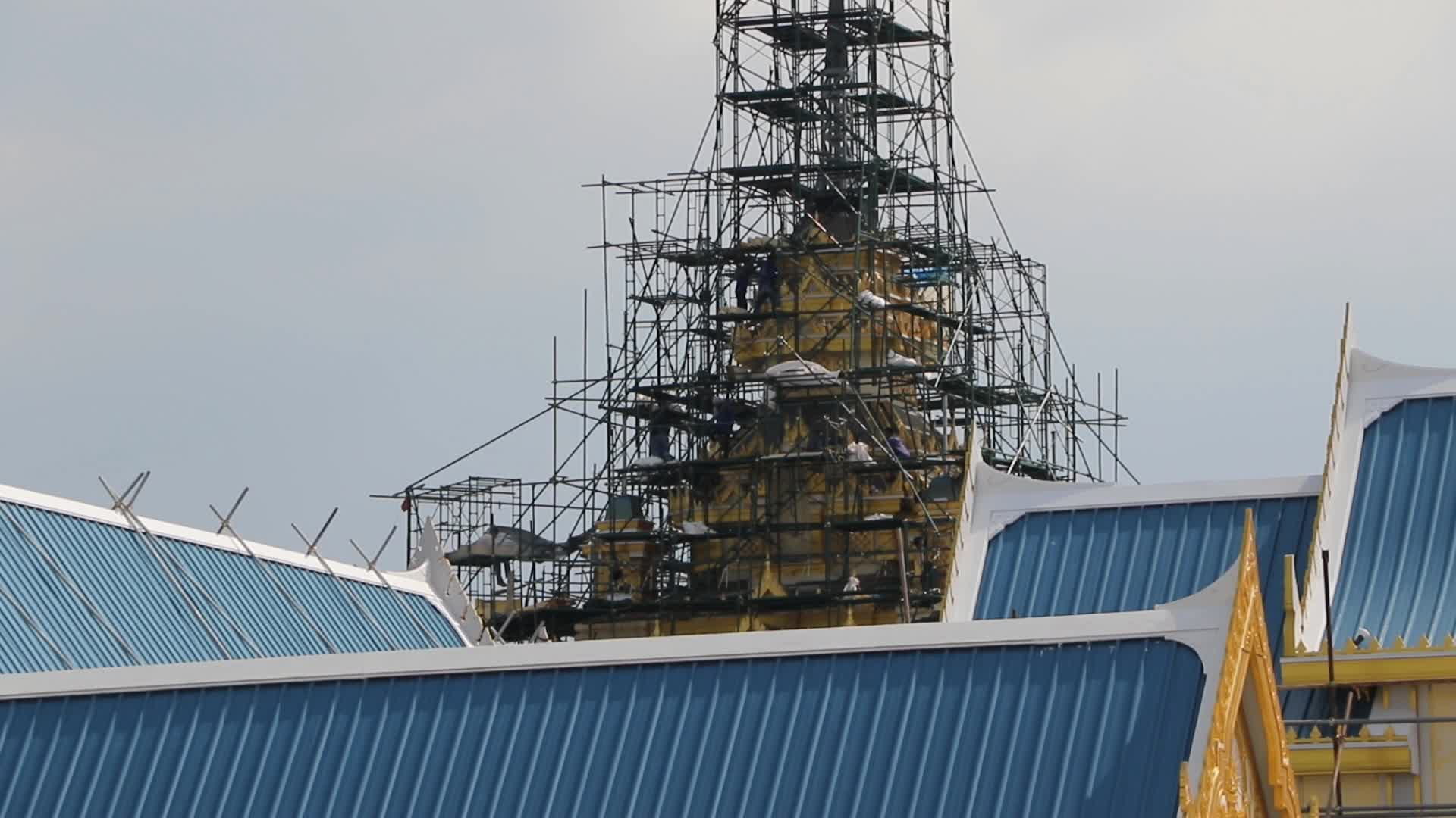 Workers work at the royal crematorium under construction at Sanam Luang in Bangkok.