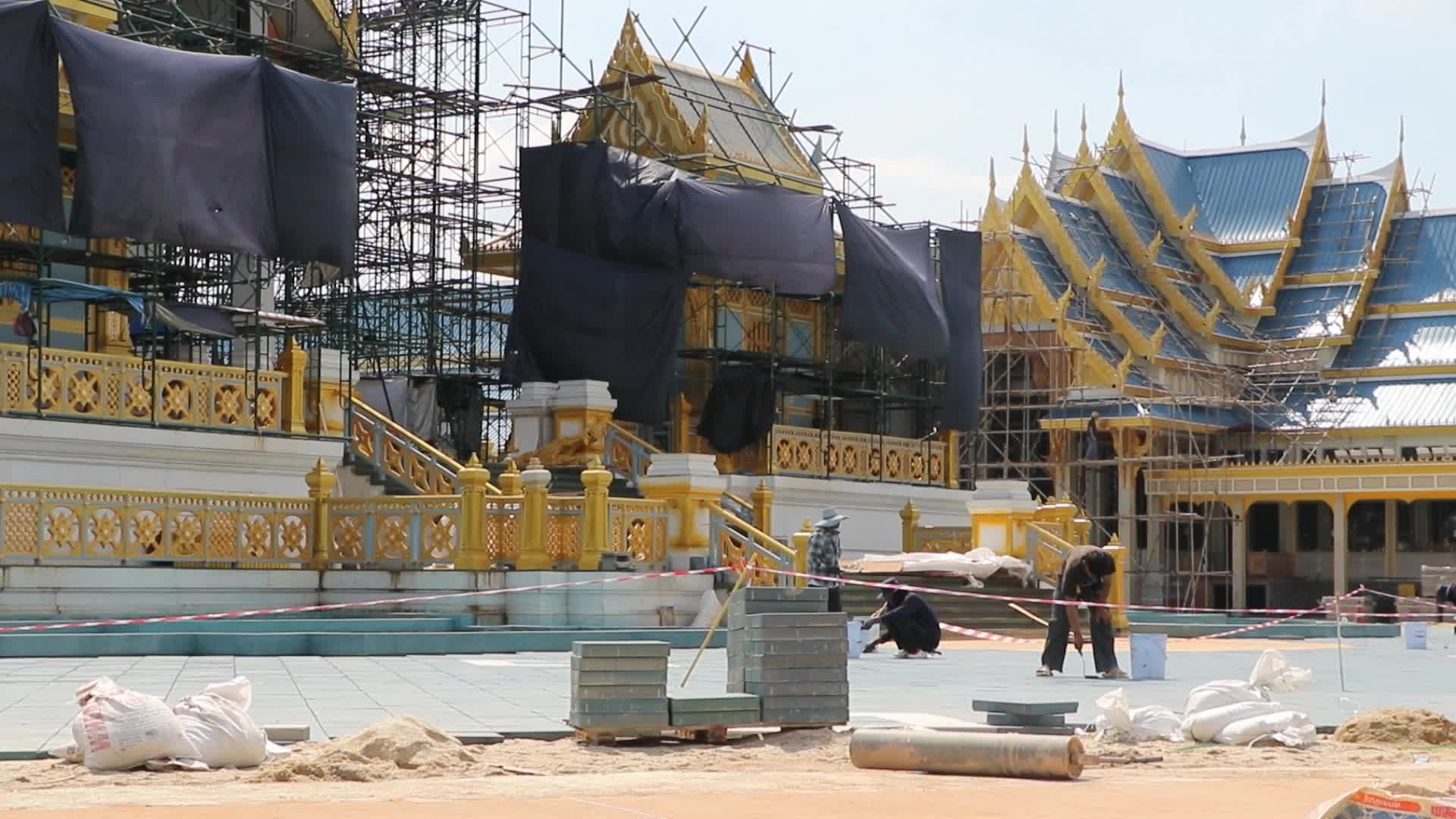 Workers work at the royal crematorium under construction at Sanam Luang in Bangkok.