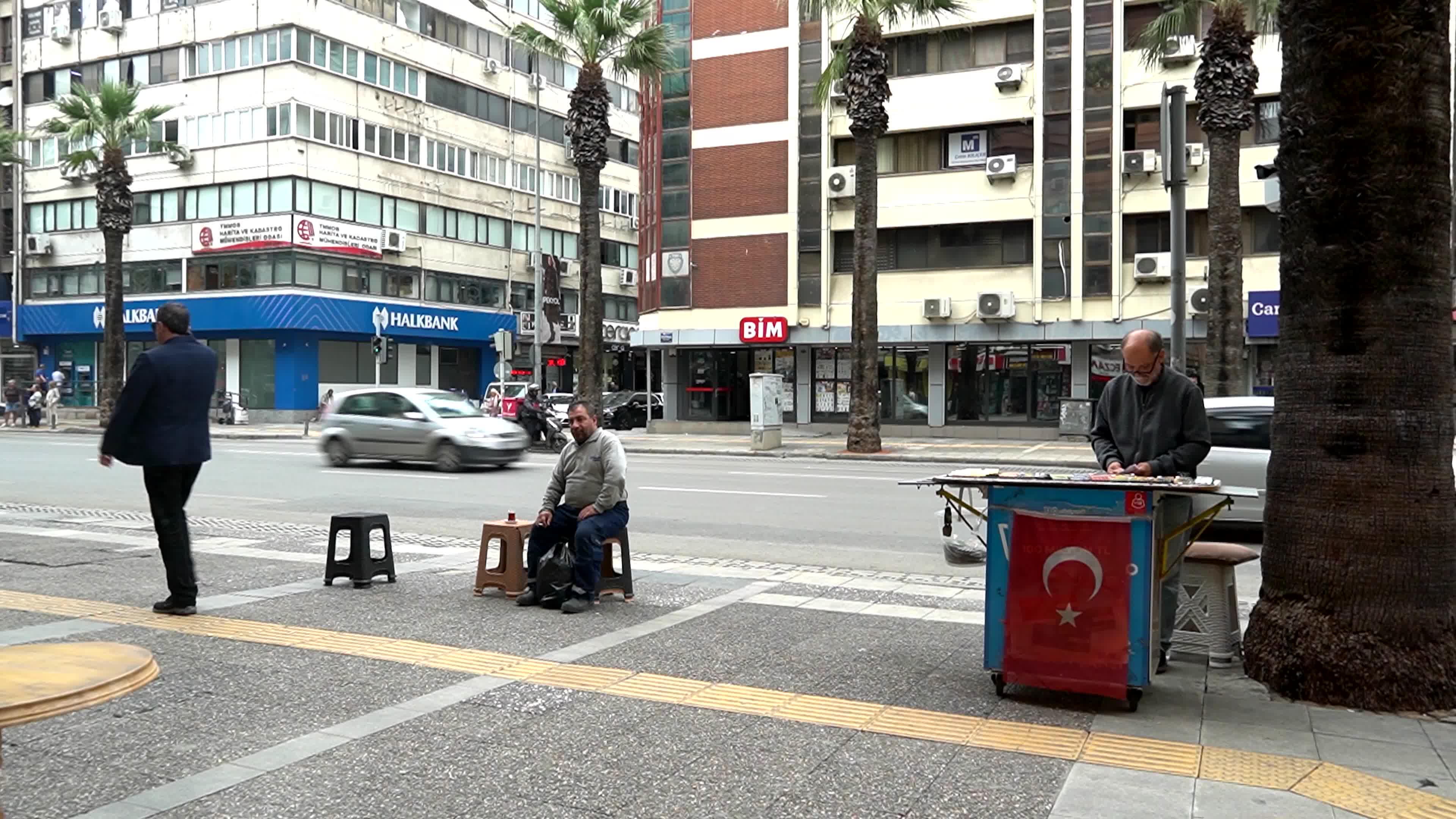 Daily life near of a modern city kiosk in an old street Basmane