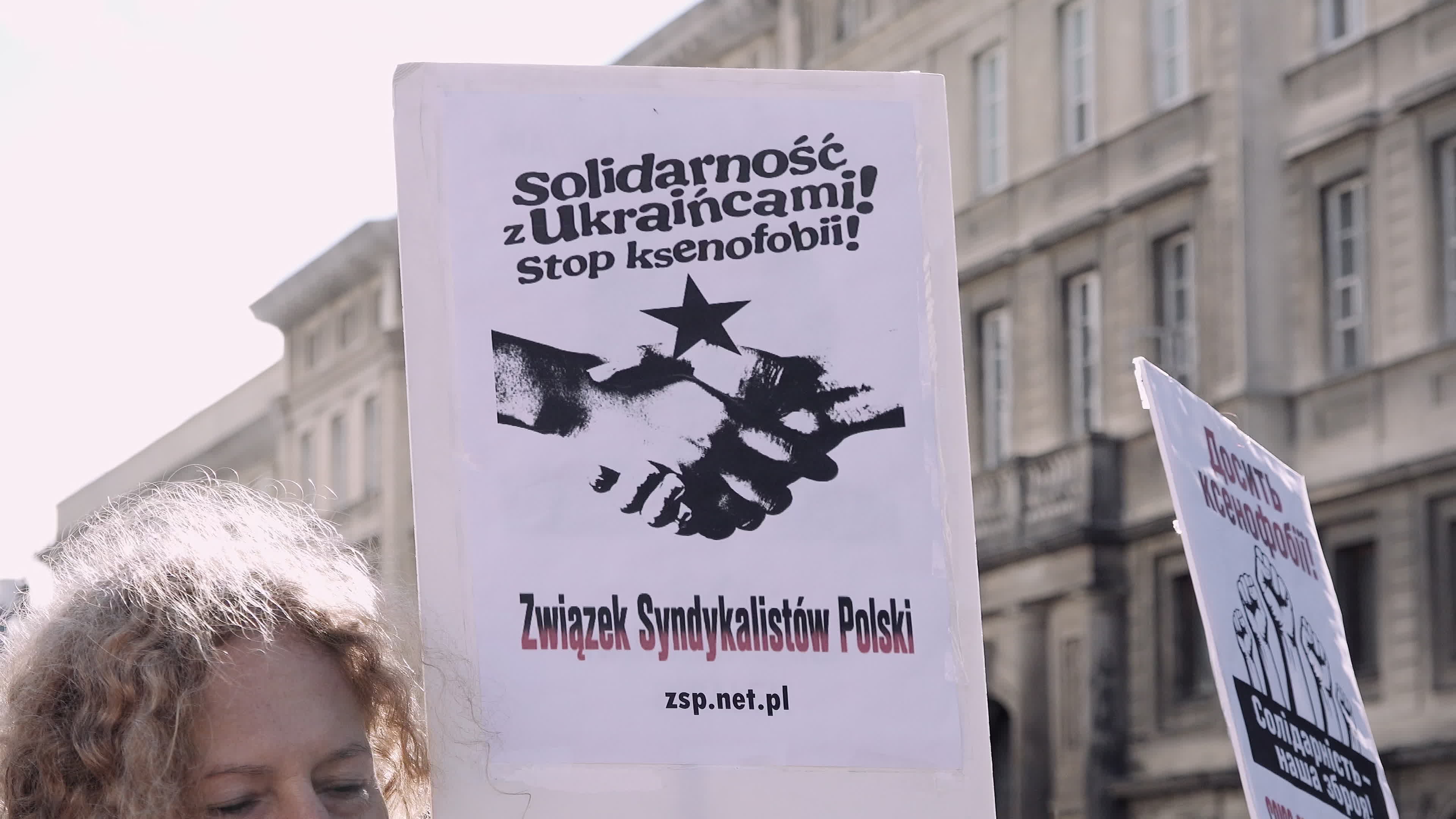 Poles rally in solidarity with Ukrainians in Warsaw