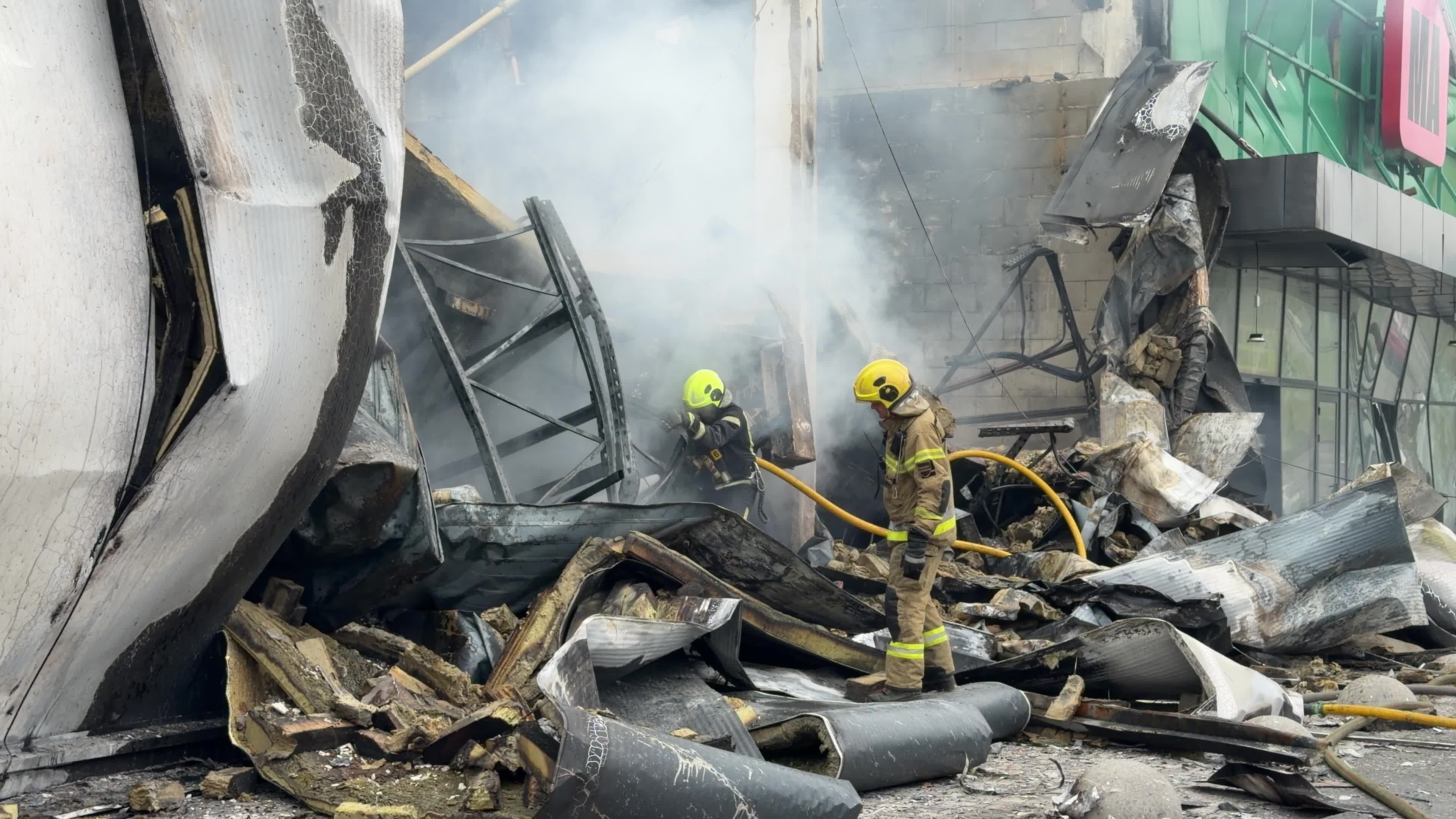 The aftermath of a Russian attack on several shopping centers in Kyiv
