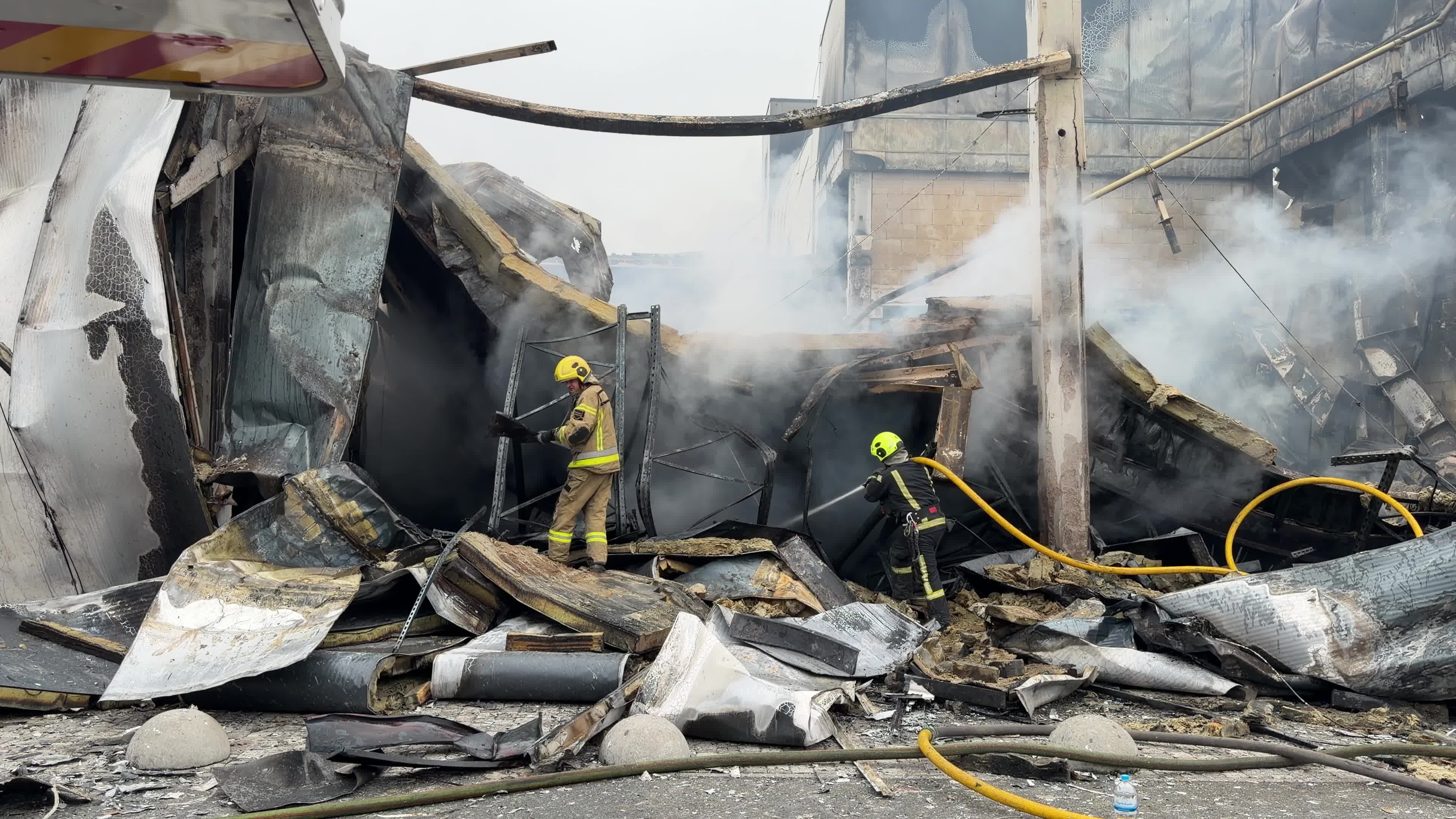 The aftermath of a Russian attack on several shopping centers in Kyiv