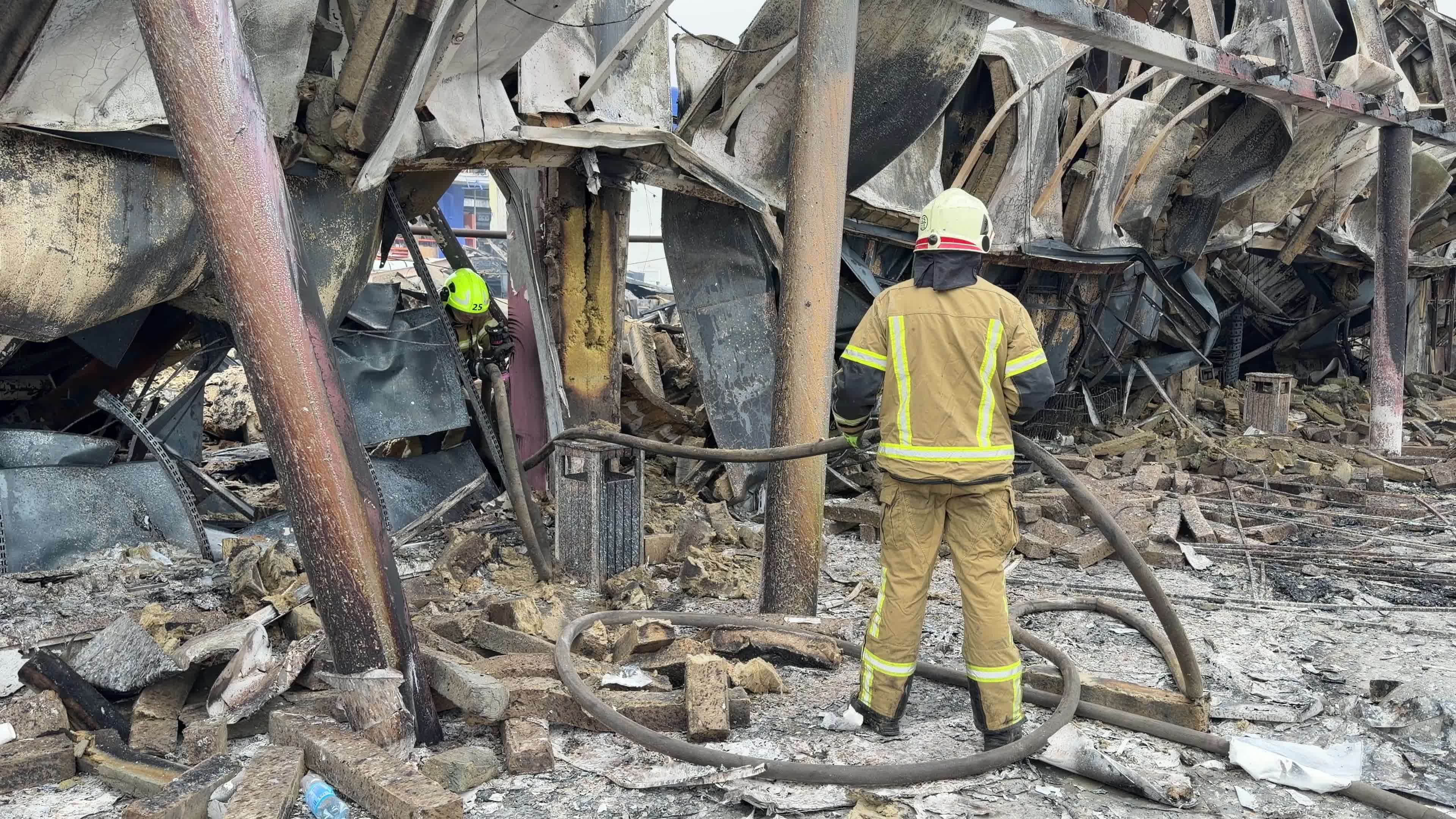The aftermath of a Russian attack on several shopping centers in Kyiv