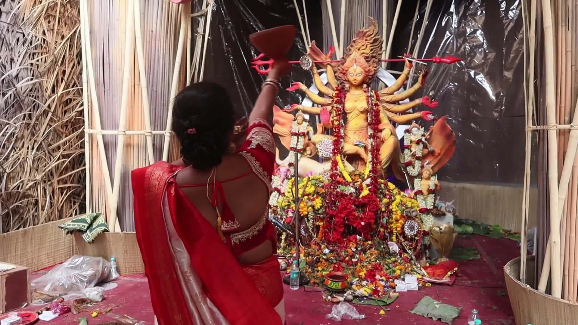 Woman practice dhunuchi dance