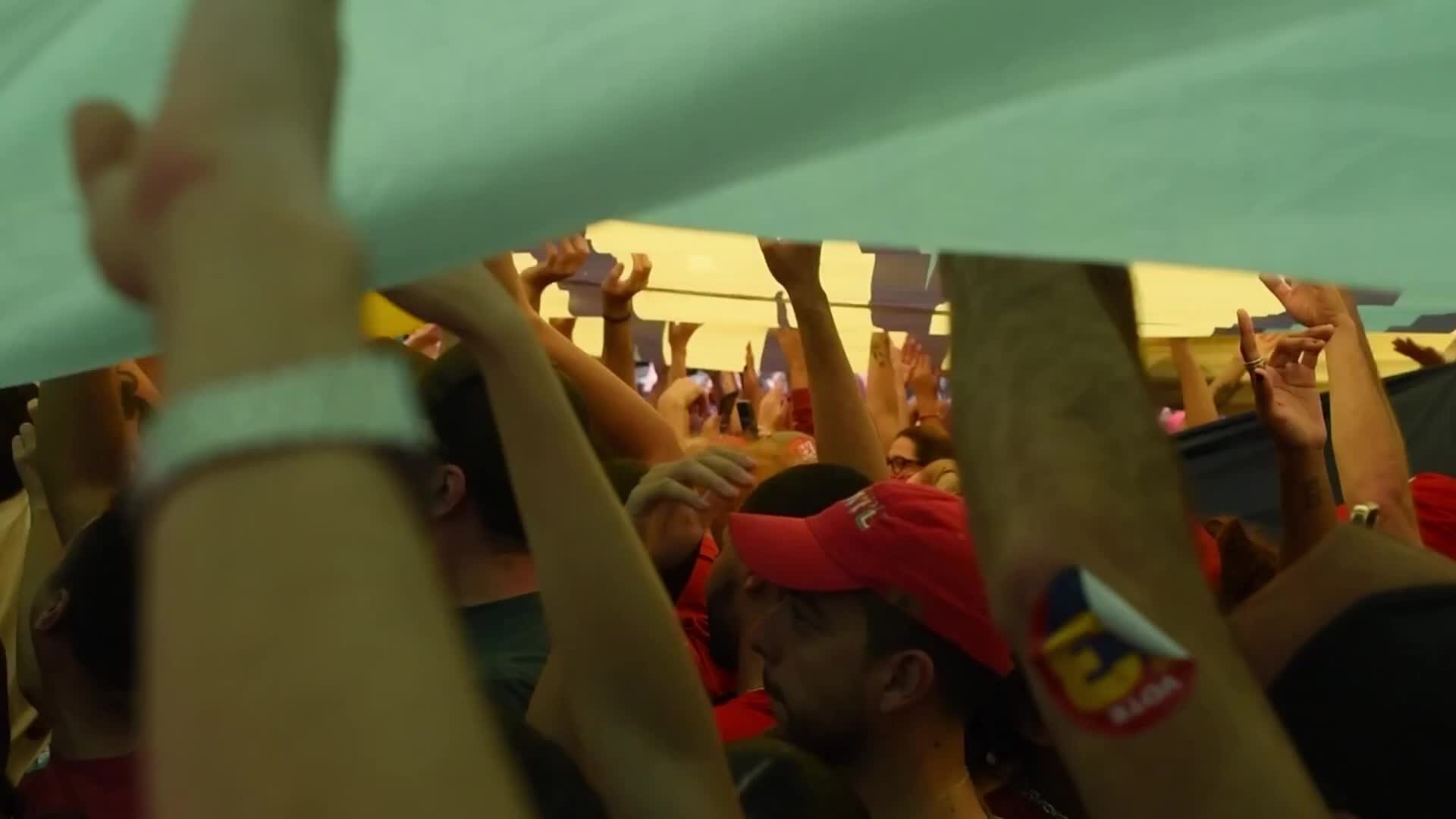 Corinthians Democracy flag and giant Brazilian flag at Lula’s last campaign rally