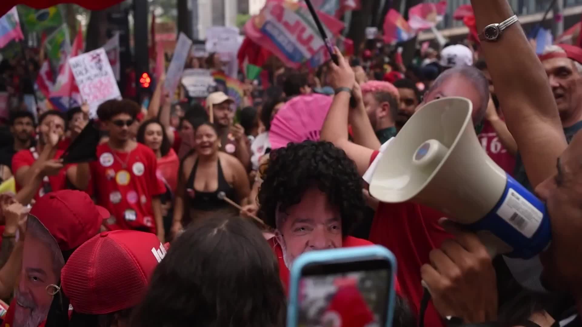 Supporters march on Paulista Avenue at Lula’s last campaign rally before Brazil’s runoff