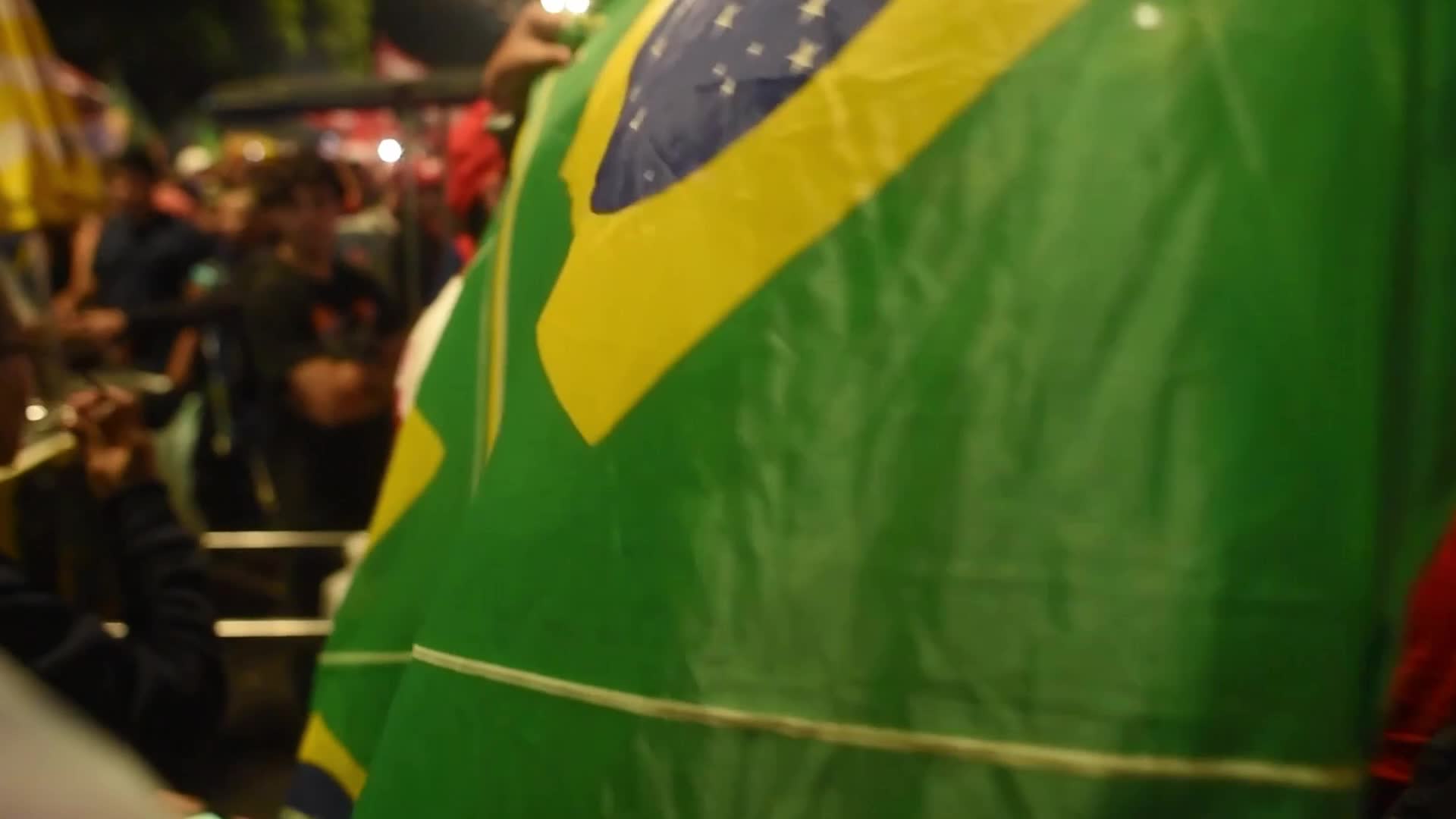 Our Lady of Aparecida raised over crowd as Lula supporters celebrate reelection