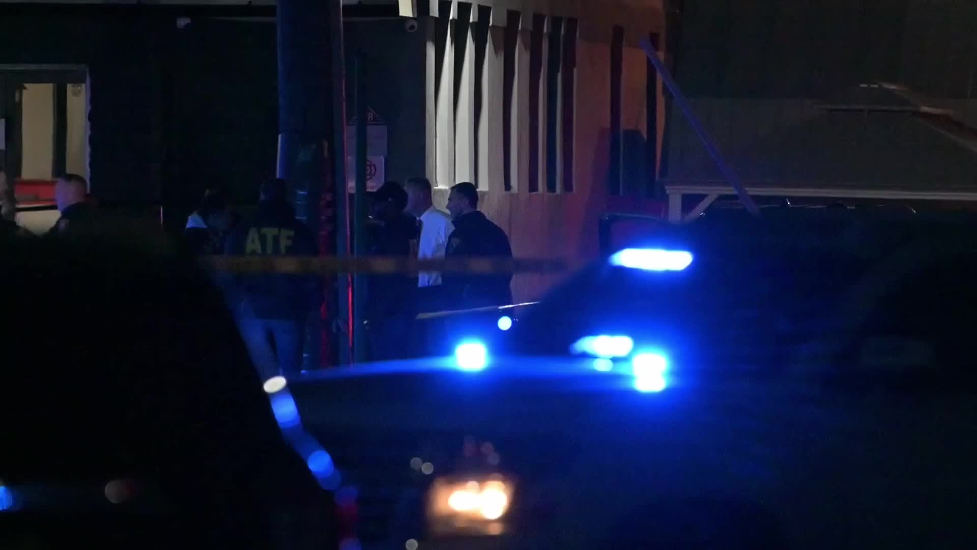 Federal agents work scene of a shooting near Commercial Avenue in Moonachie New Jersey