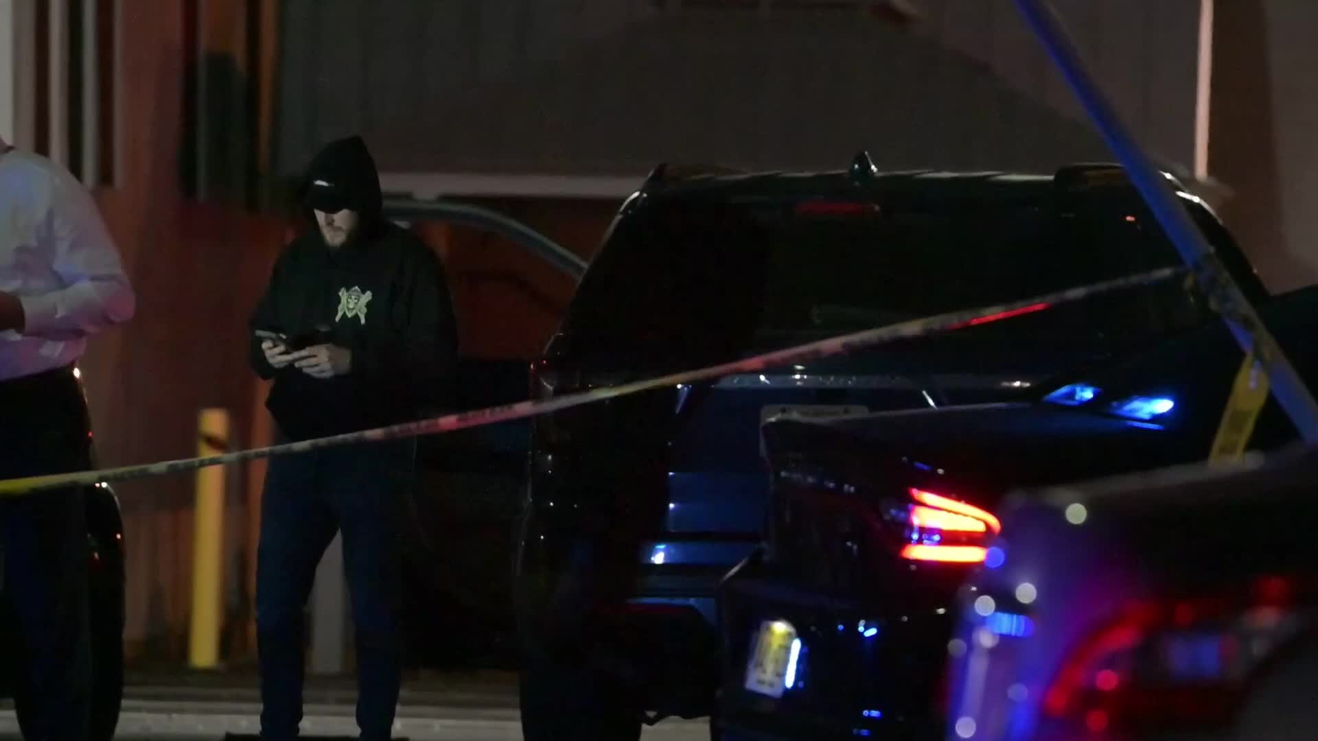 Federal agents work scene of a shooting near Commercial Avenue in Moonachie New Jersey