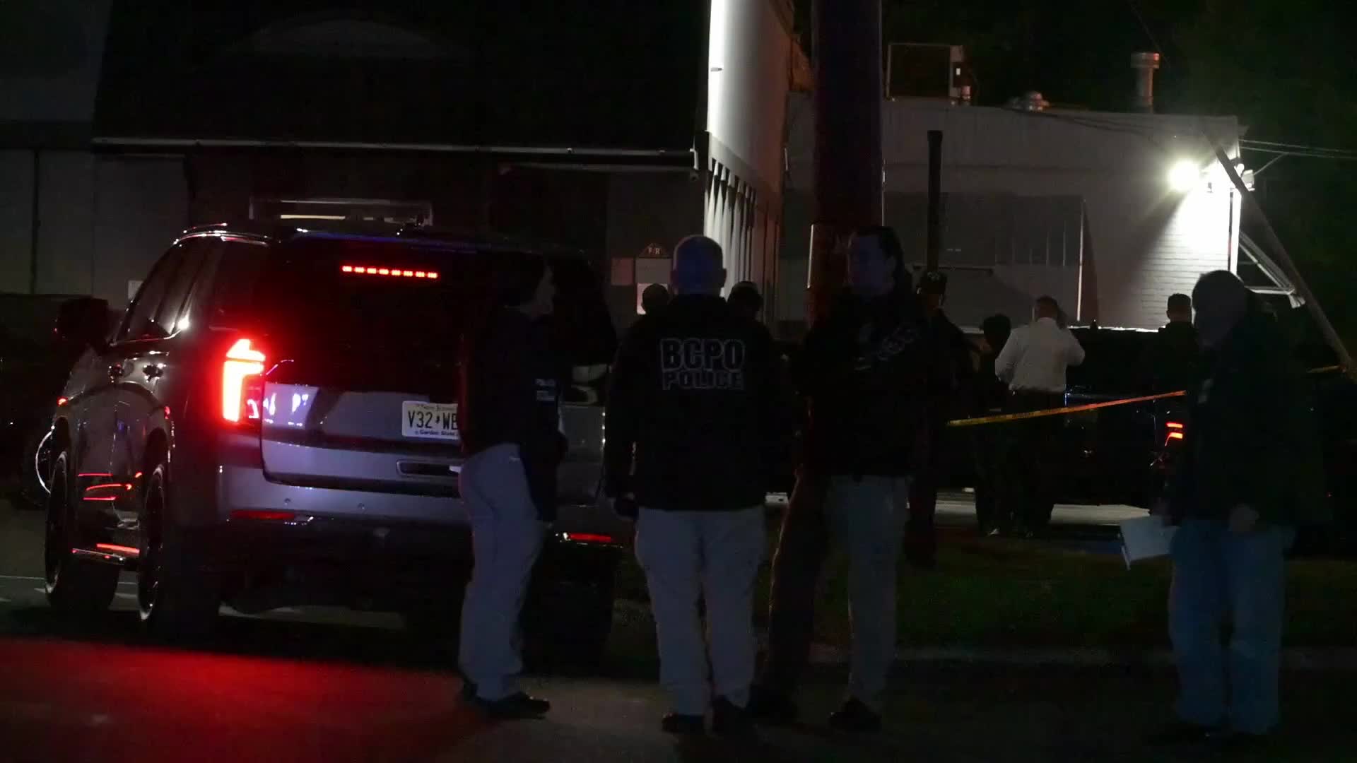Federal agents work scene of a shooting near Commercial Avenue in Moonachie New Jersey