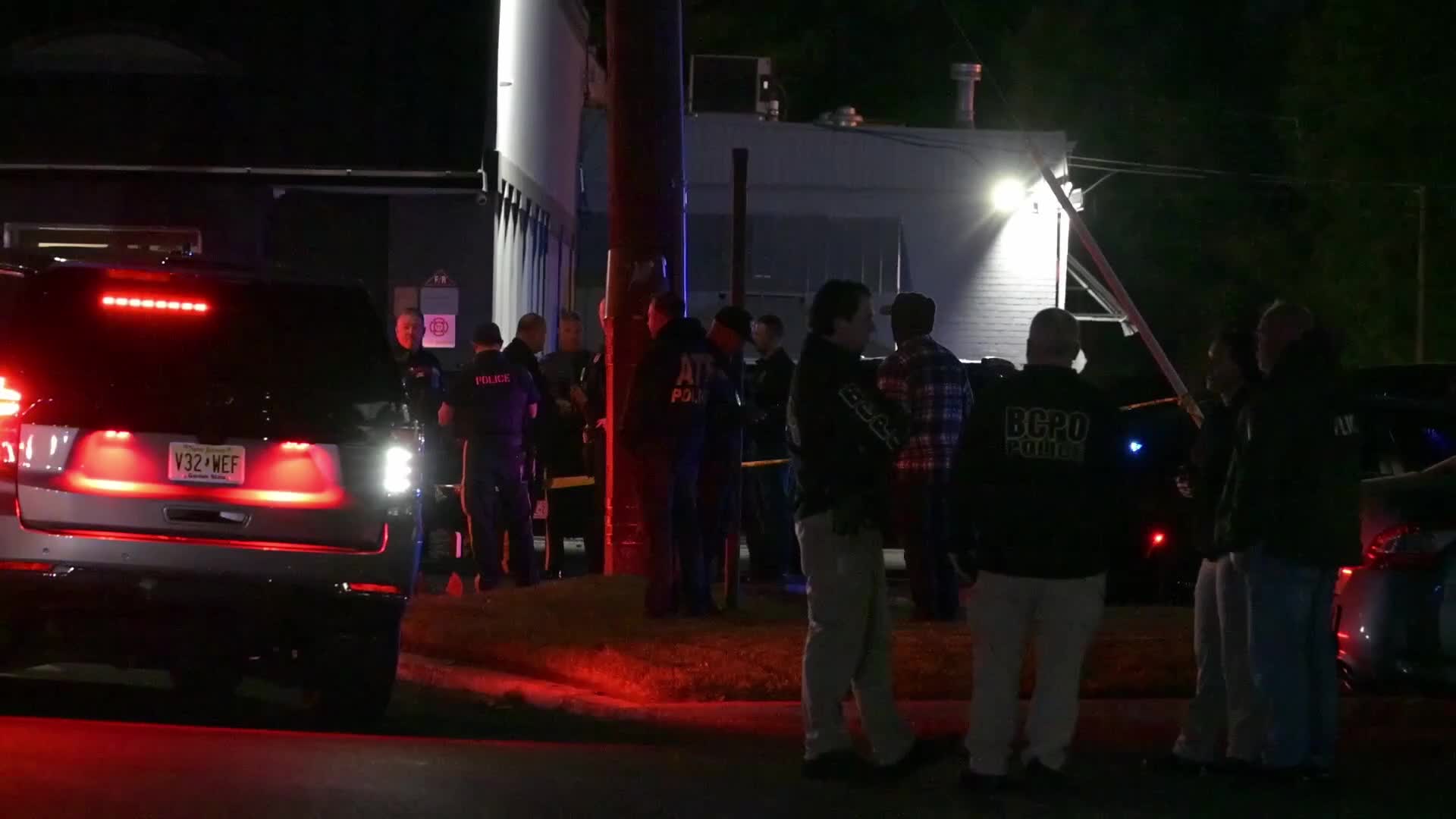 Federal agents work scene of a shooting near Commercial Avenue in Moonachie New Jersey